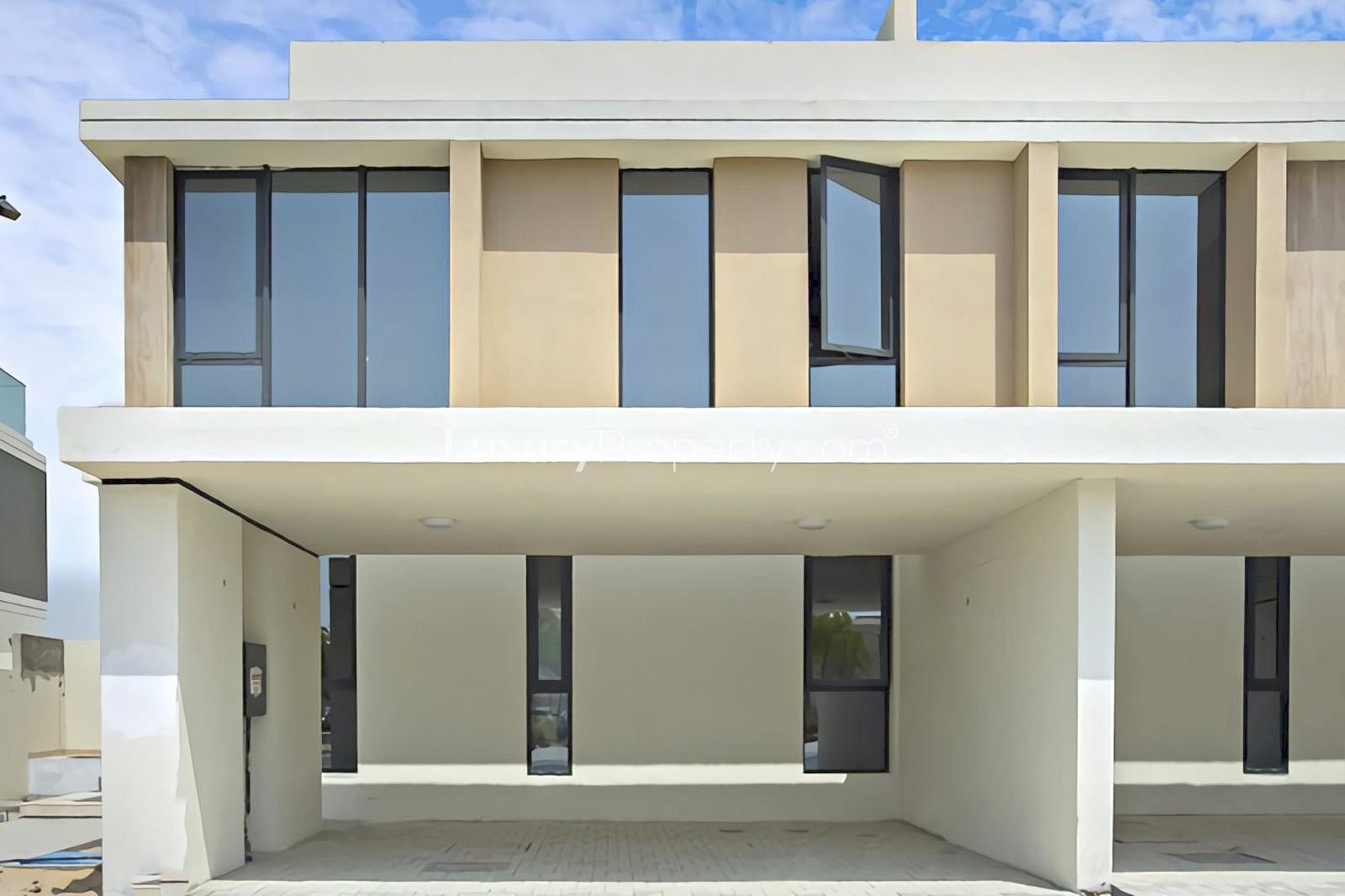 Bright living area with large windows in Dubai Hills Estate villa for sale