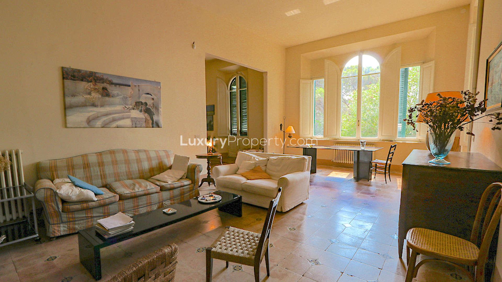 Spacious living room in 4-bedroom coastal villa, Quercianella, Italy, with elegant furnishings
