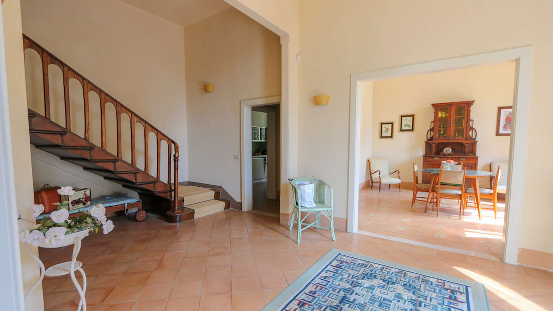 "Elegant interior of 4-bedroom coastal villa in Quercianella, featuring staircase and dining area.",N/A,Dining area in stunning 4-bedroom coastal villa, Quercianella, Italy, with elegant furnishings