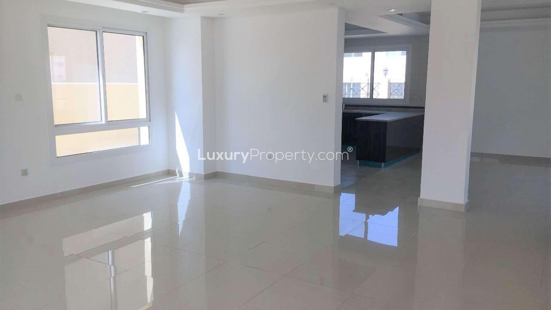 "Bright room with balcony view in Dubailand's 4-bedroom villa, Living Legends community.",Spacious living area in 4-bedroom villa, D Villas, Dubailand, for sale