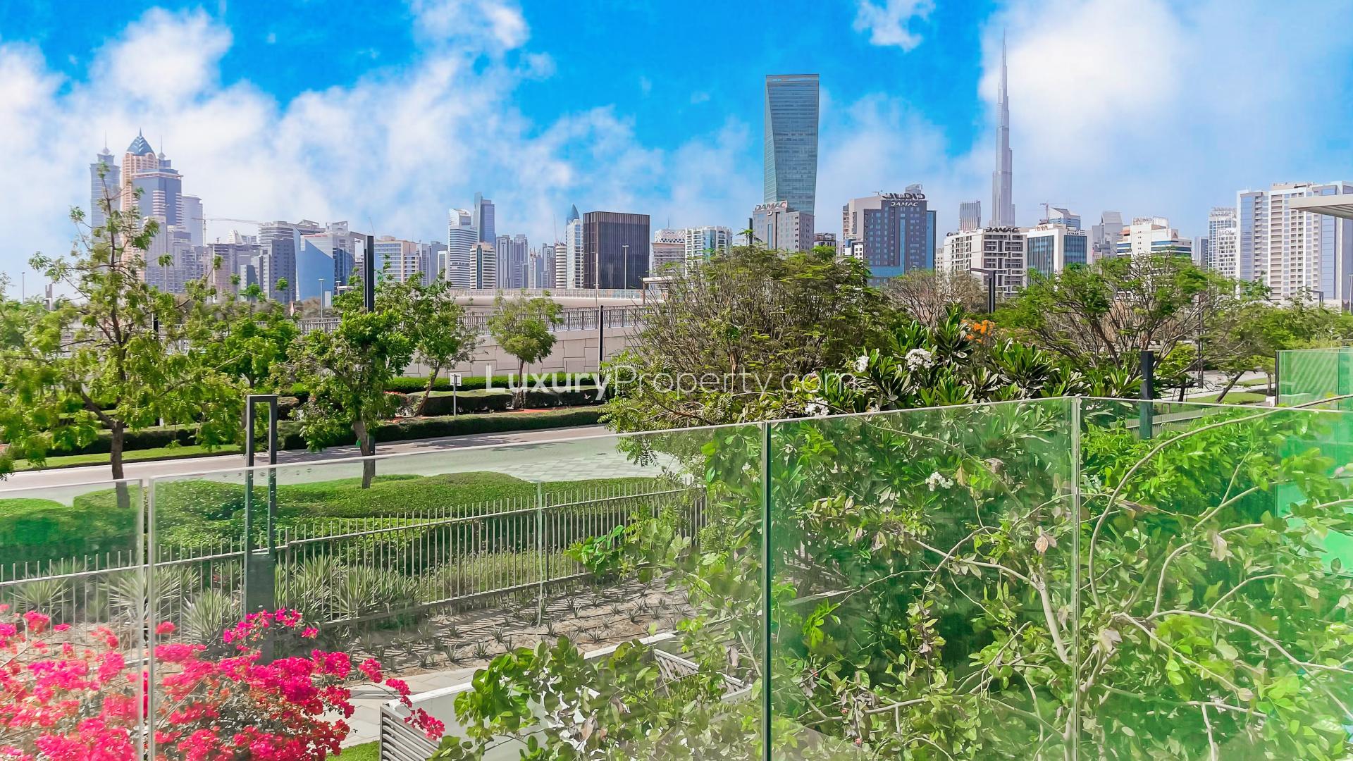 Contemporary villa interior with large windows and garden view in District One, Dubai