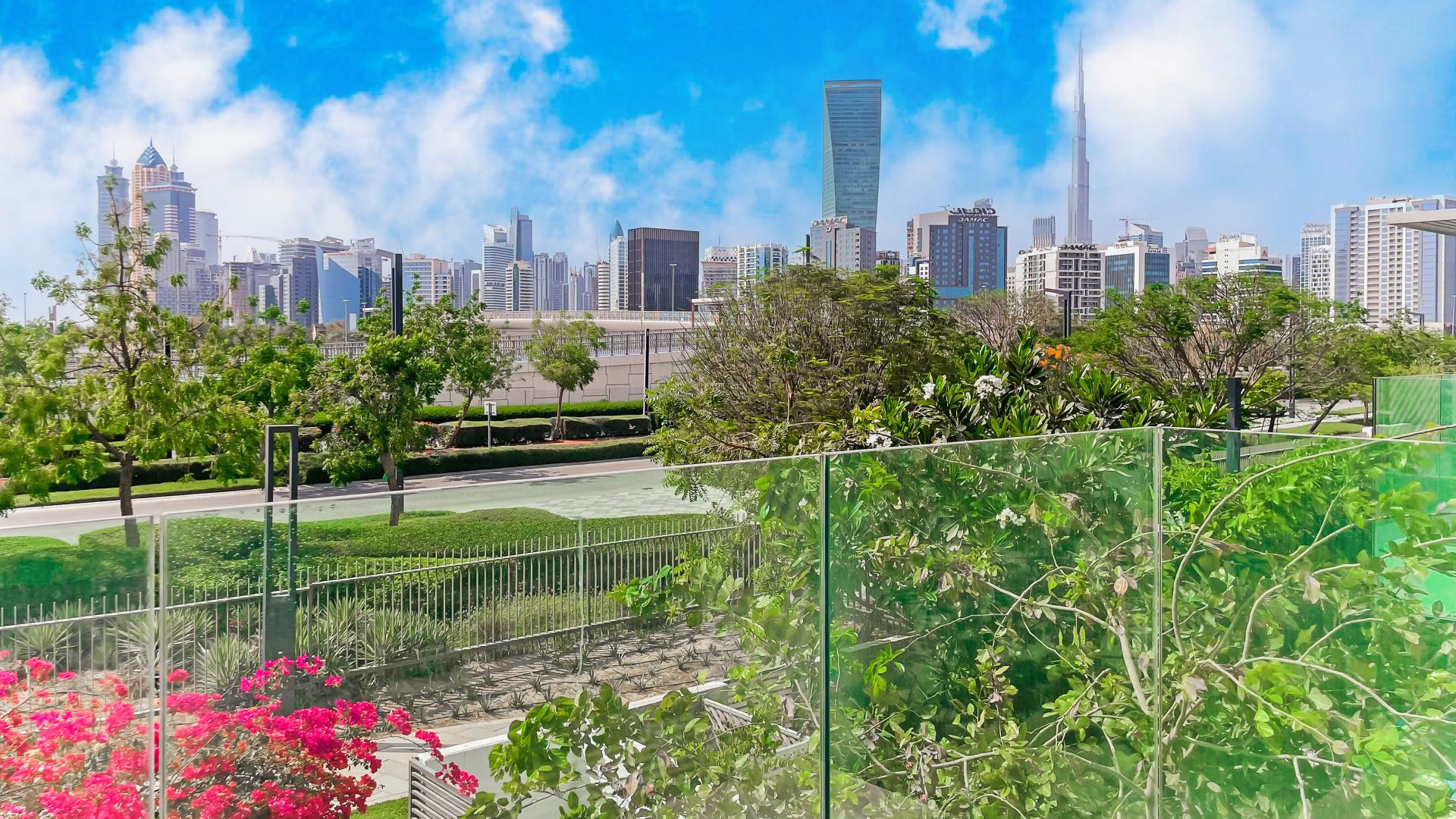 Contemporary villa interior with large windows and garden view in District One, Dubai