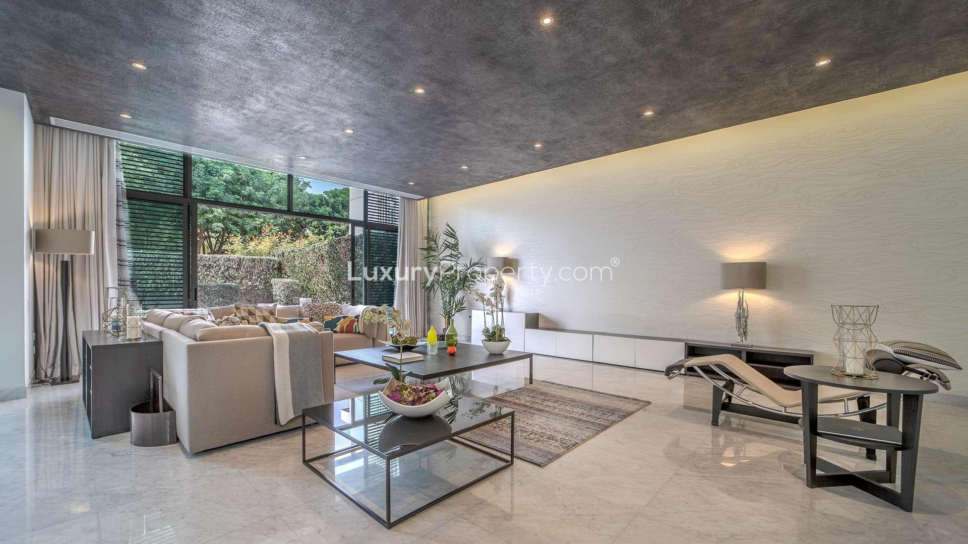 Luxurious living room in upgraded four-bedroom villa, District One, Dubai. Modern interior design