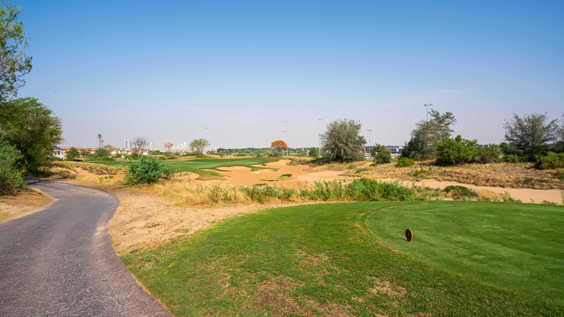 Empty room with French doors, tiled floor, and garden view in Muirfield Type Villa