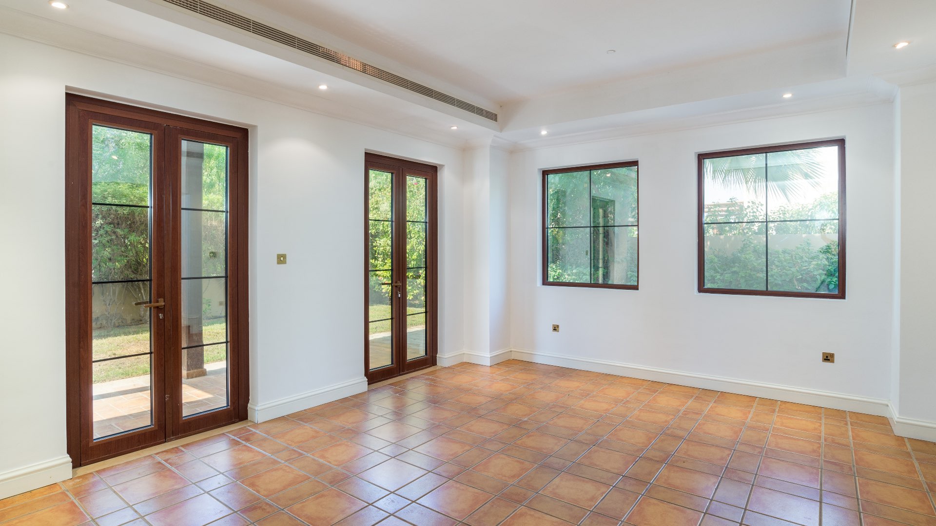Exterior view of Almeria villa with stone facade in Jumeirah Golf Estates' Earth community