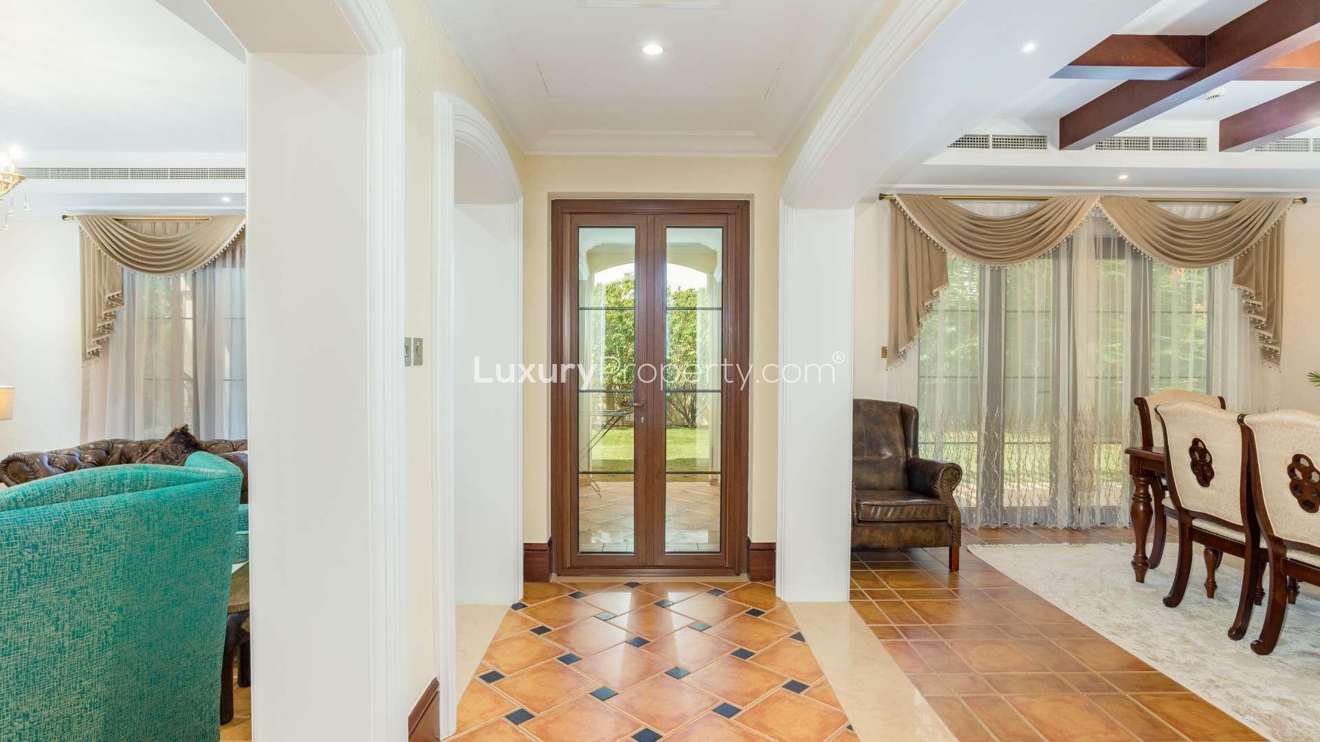 "Elegant entryway in upgraded four-bedroom villa, Jumeirah Golf Estates, Earth community, for sale.",Elegant dining room in upgraded four-bedroom villa, Jumeirah Golf Estates, Earth community