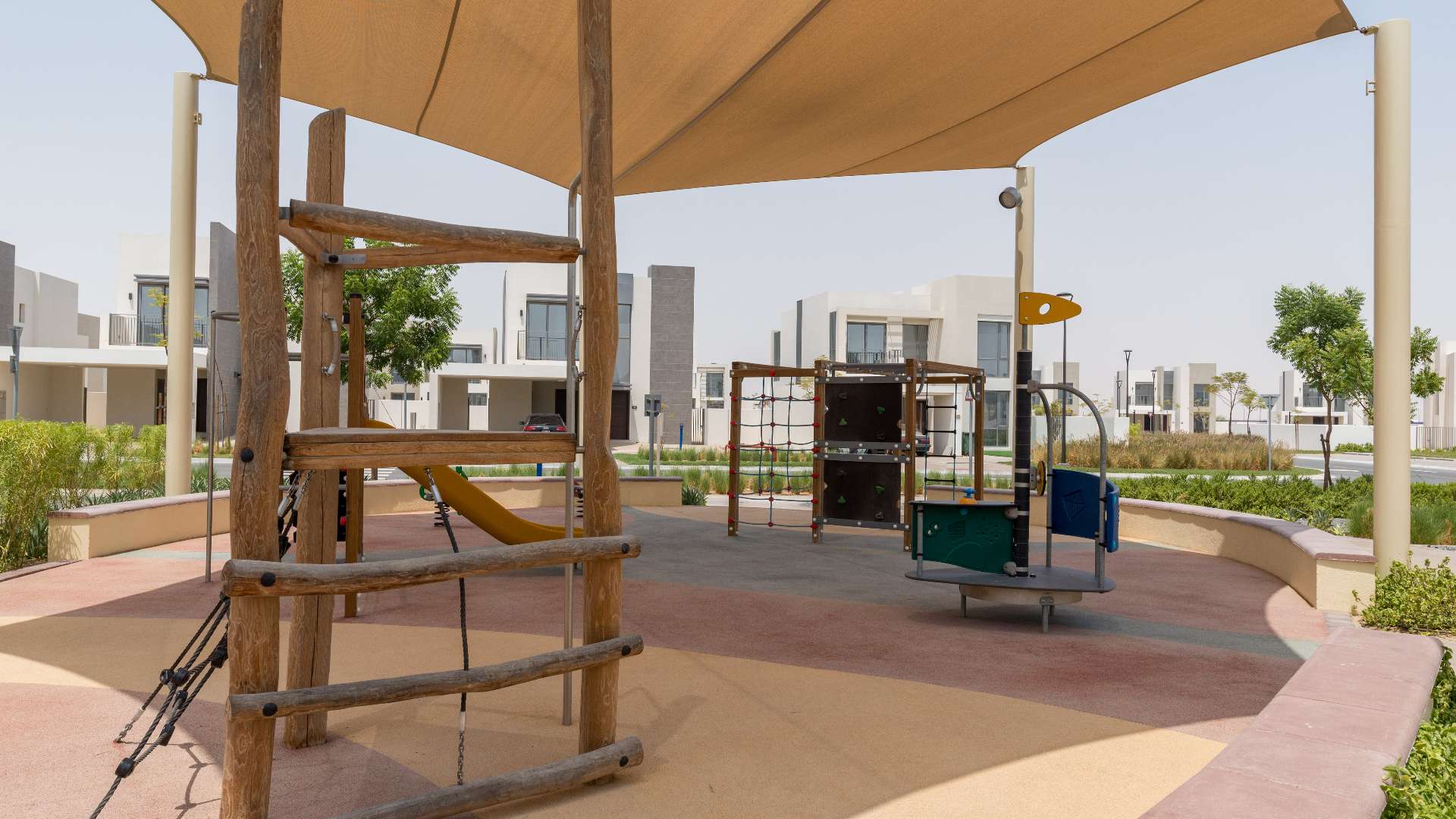 Outdoor pool area with sun loungers at Emaar South Golf Links villa for sale