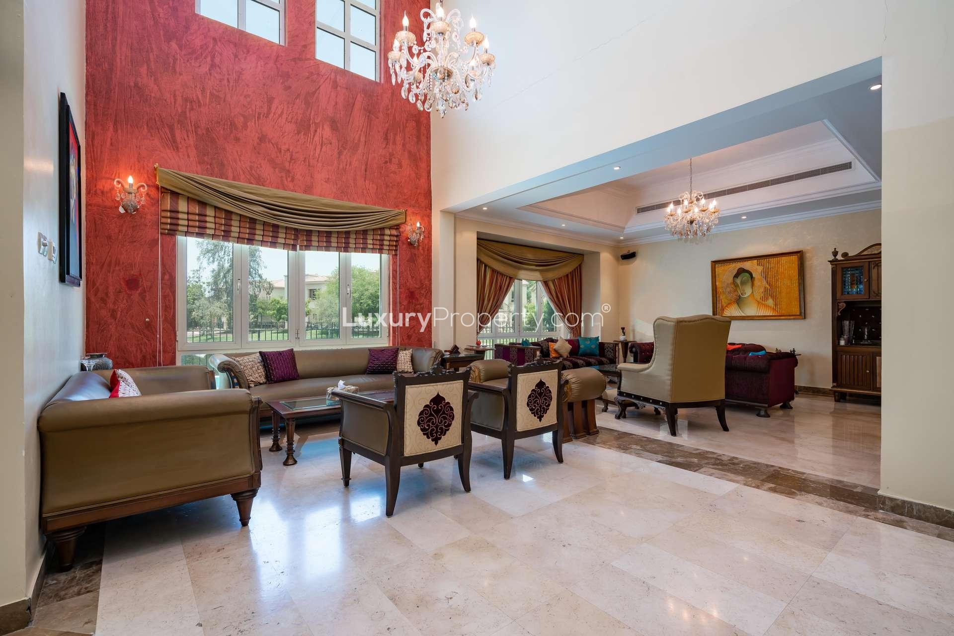"Luxury villa with pool and lake view in Jumeirah Islands European Clusters.",Luxurious living room in upgraded 4-bedroom villa, Jumeirah Islands, European Clusters