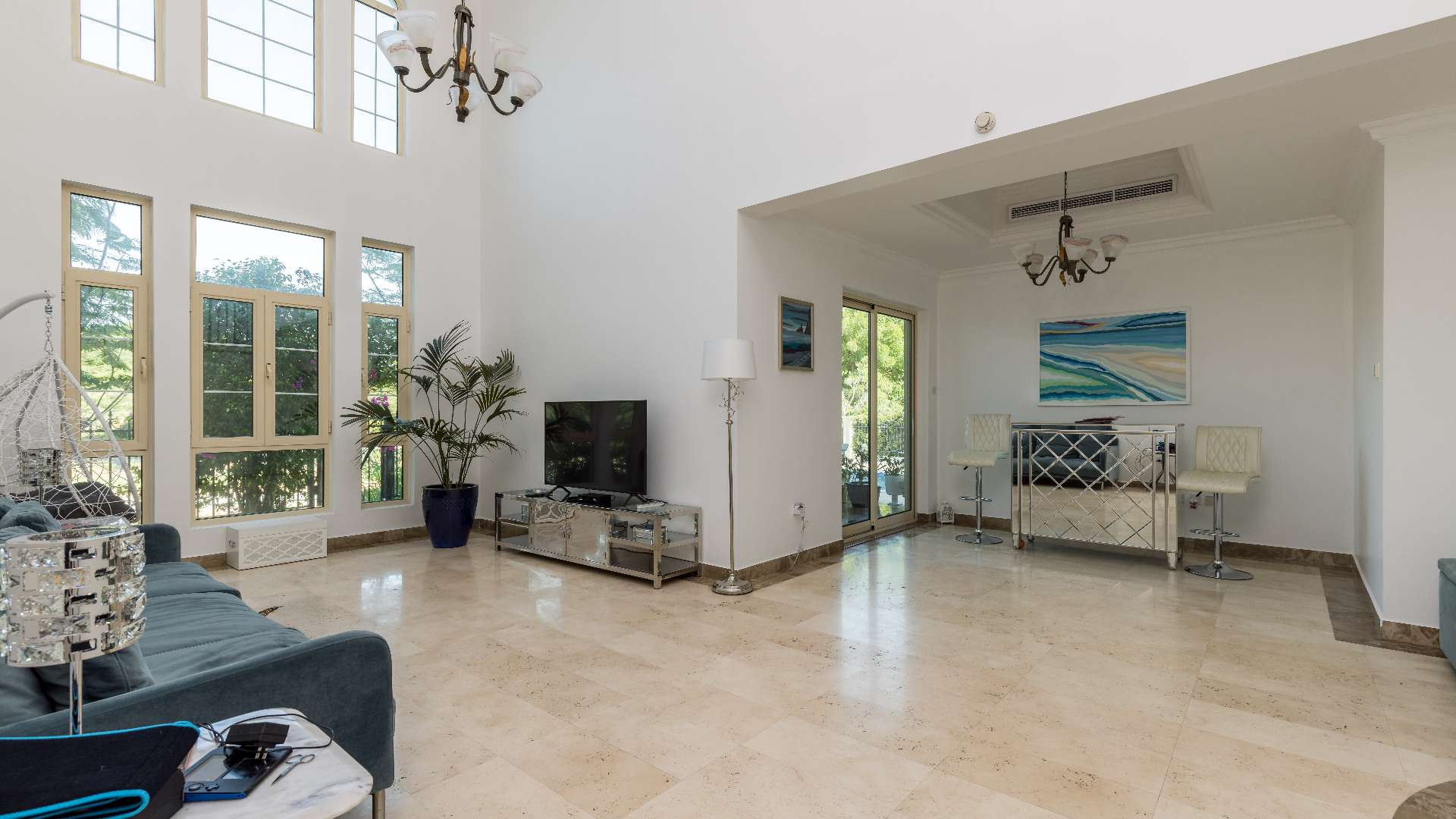 Hallway in Spanish style villa, featuring decorative railing and colorful artwork in Jumeirah Islands