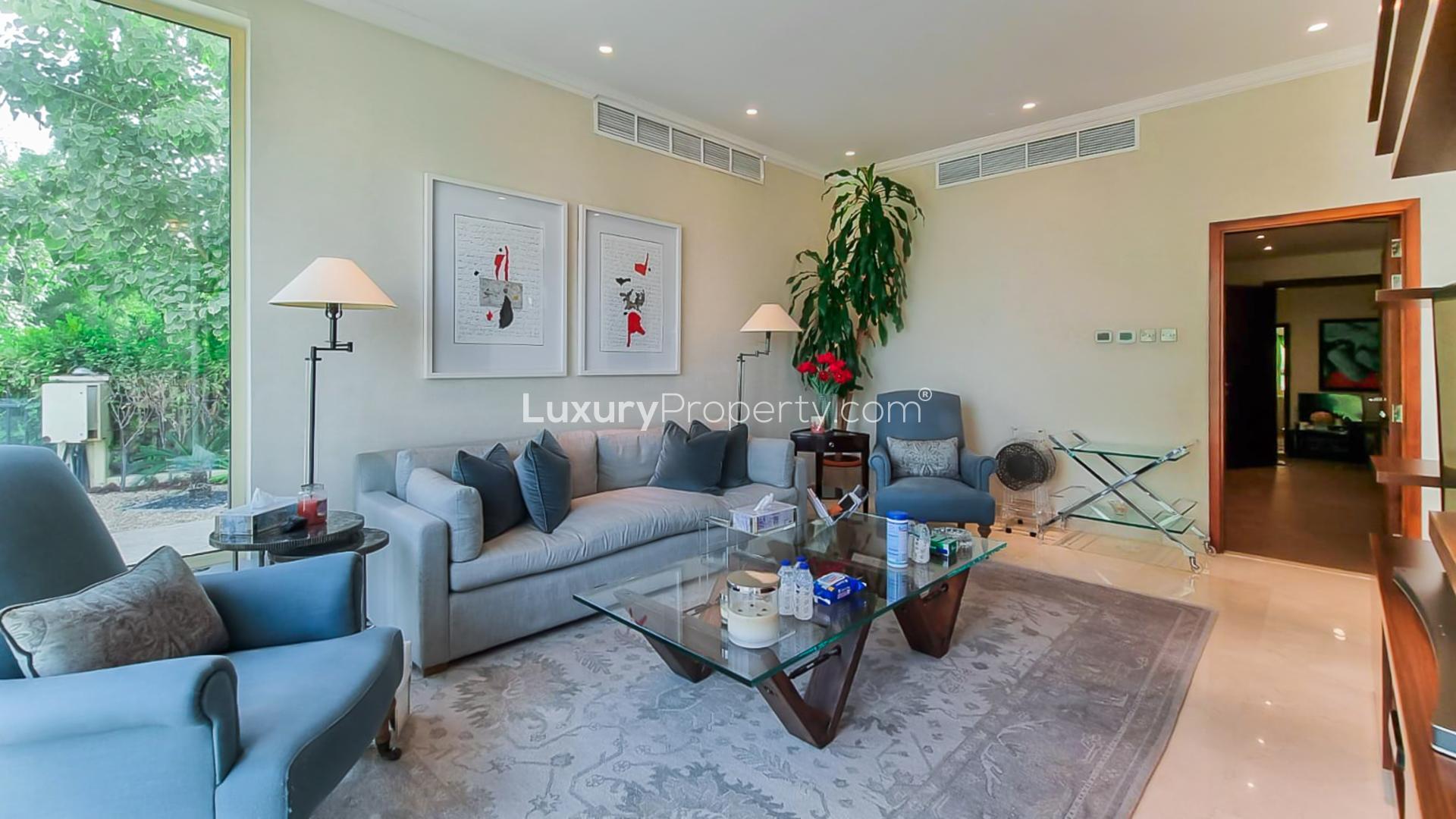 Luxurious living room in fully upgraded Jumeirah Islands villa, European Clusters, for sale