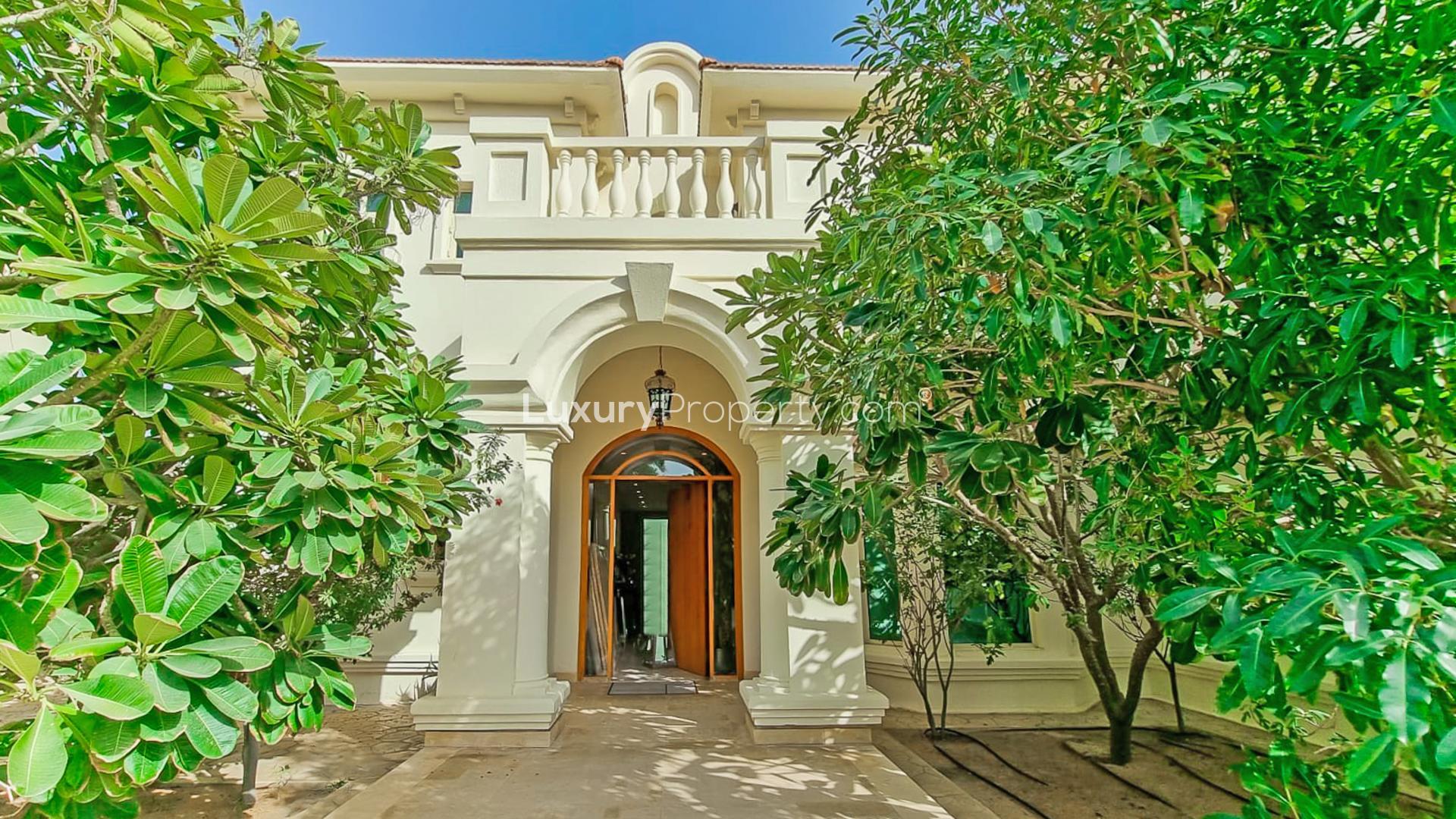 Luxurious fully upgraded villa exterior in Jumeirah Islands, European Clusters, for sale