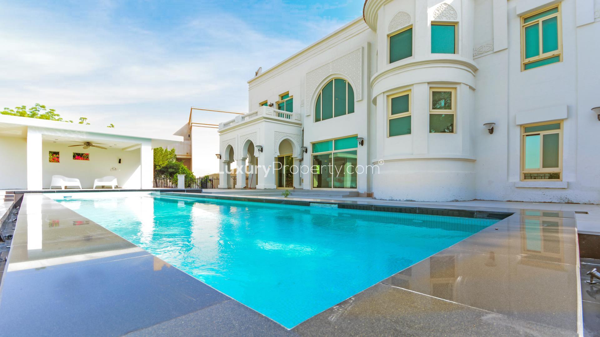 Luxurious interior of furnished villa in Jumeirah Islands' European Clusters, featuring modern decor