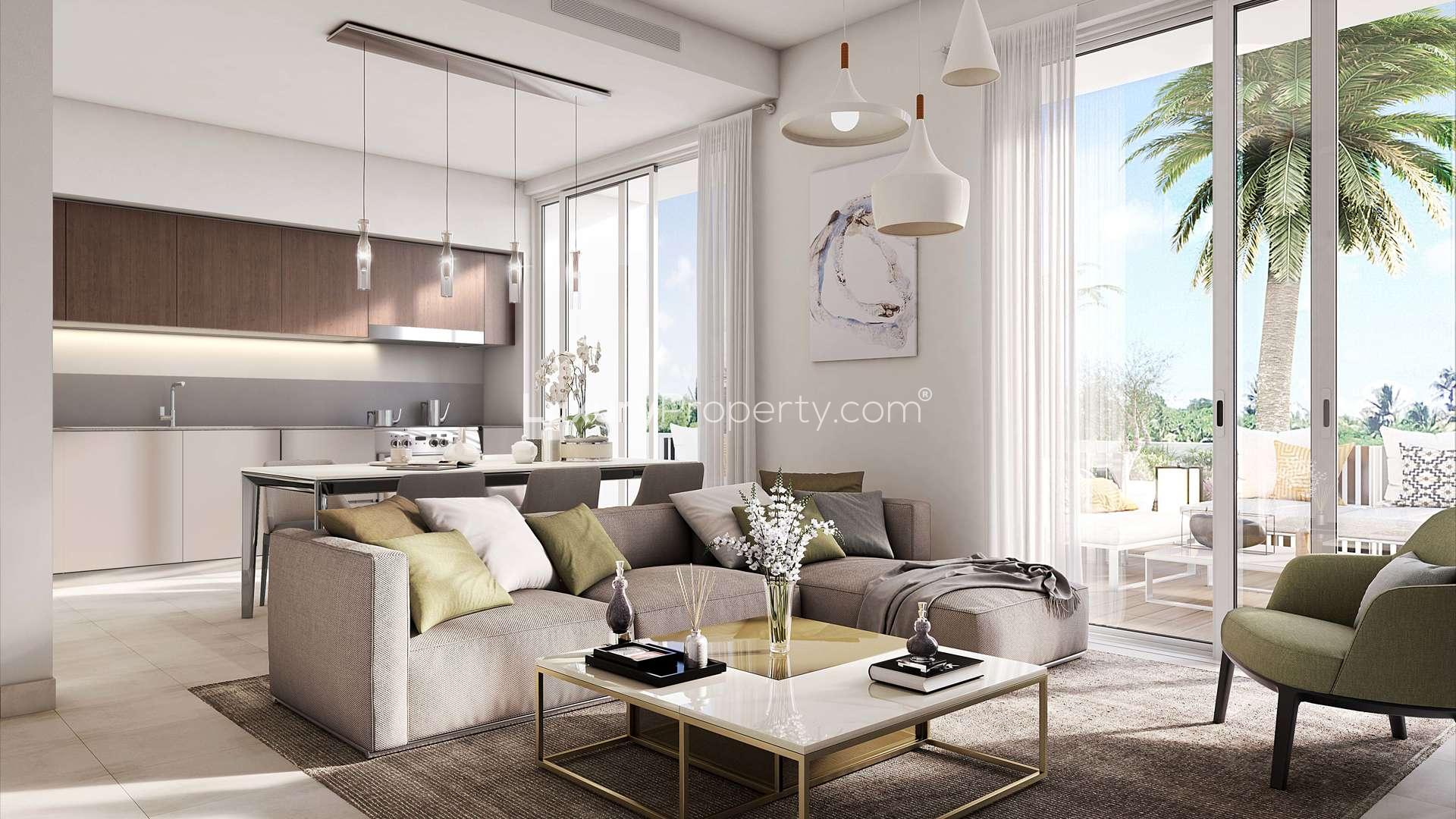 Luxurious living room in Emaar South villa with modern decor and large windows