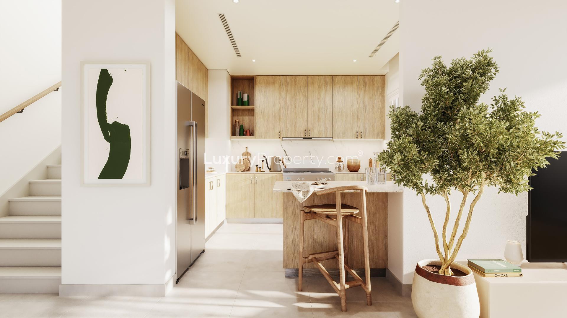 Modern living room in luxury Fairway Villas, Emaar South, with garden view and stylish decor