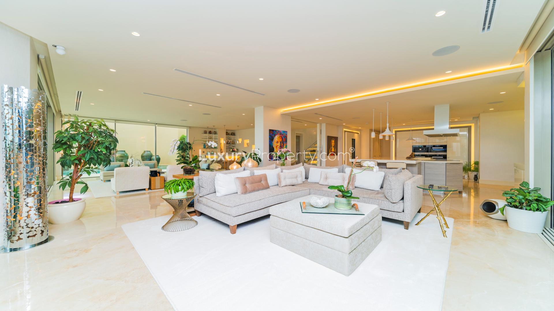 Luxurious living room with waterfront view in fully upgraded Palm Jumeirah villa