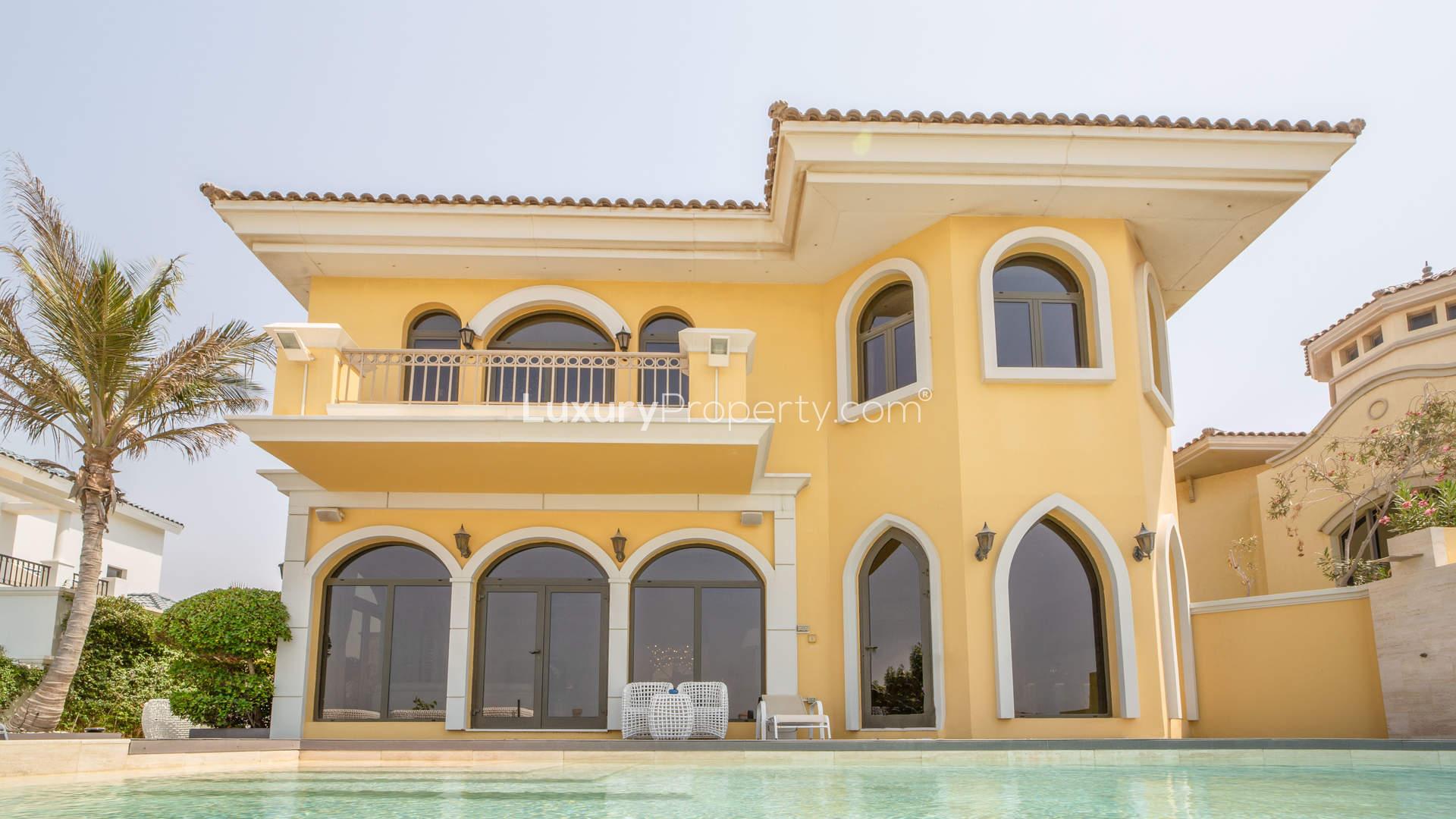 Upgraded 4-bedroom villa exterior with palm trees, Garden Homes, Palm Jumeirah