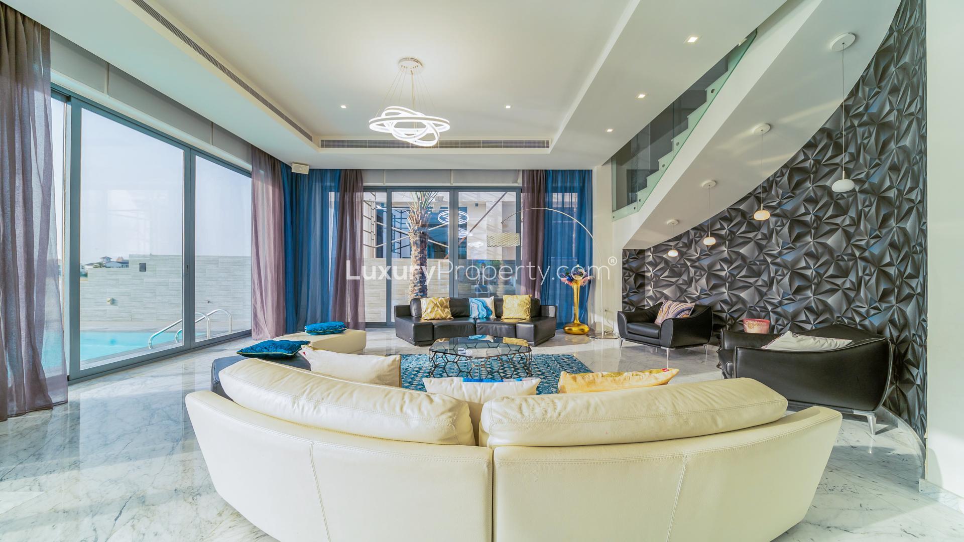 Luxurious Palm Jumeirah villa with pool and stunning beachfront sunset view for sale