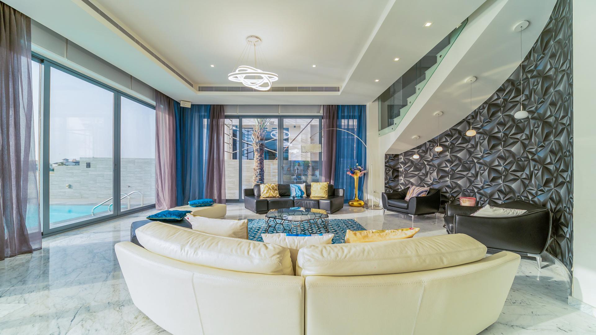 Luxurious Palm Jumeirah villa with pool and stunning beachfront sunset view for sale