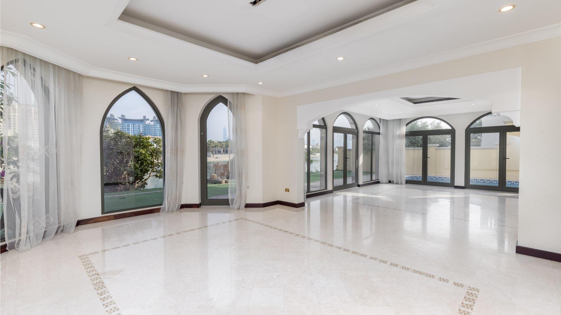 Atrium Entry Villa balcony view, Palm Jumeirah waterfront, skyline in distance, Garden Homes