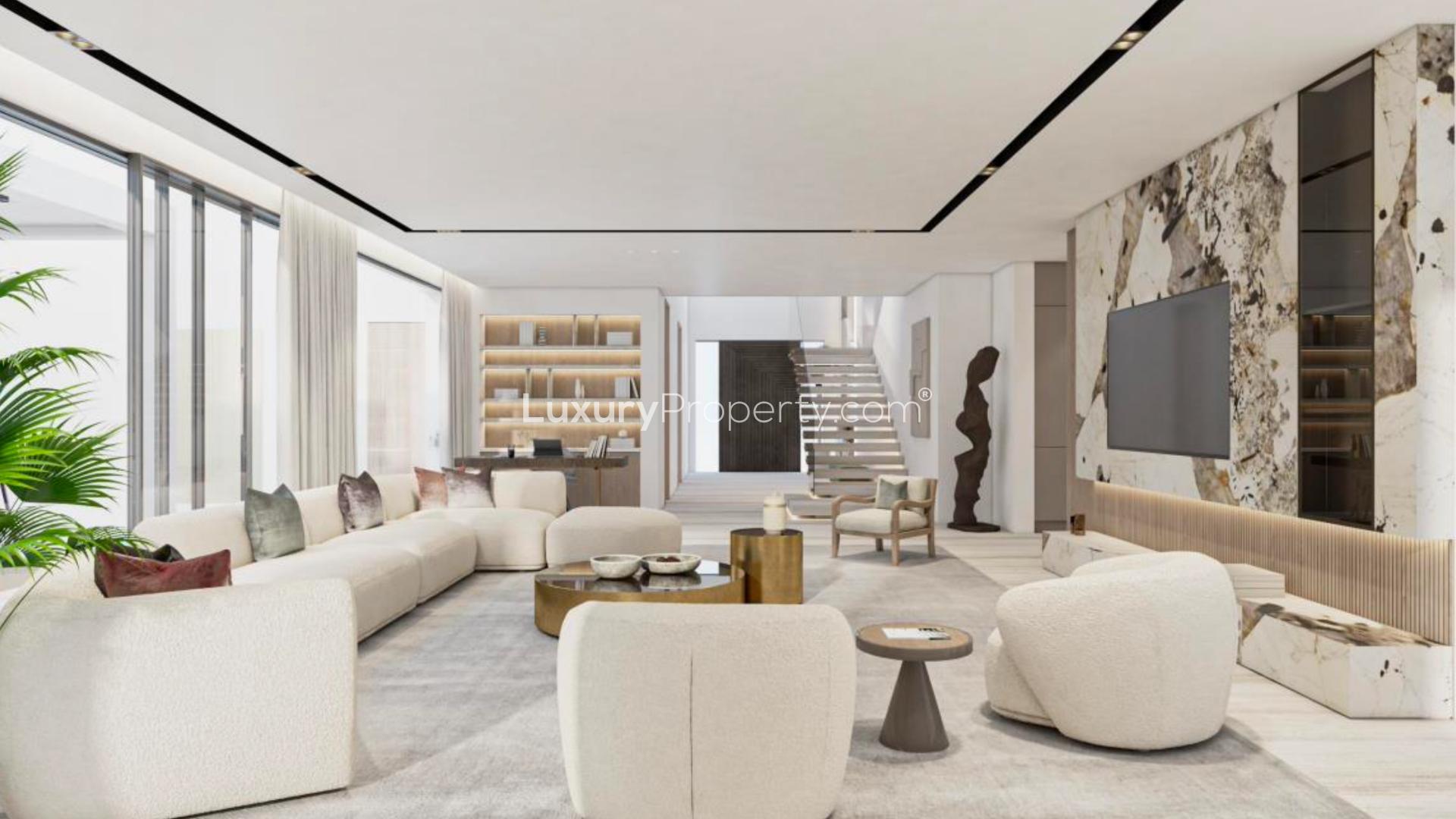 Custom-built villa exterior in Palm Jumeirah, featuring modern design and landscaped garden