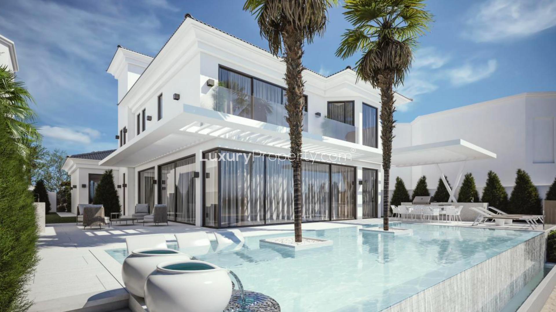 Custom-built villa exterior in Palm Jumeirah, Garden Homes, with modern design and landscaped garden