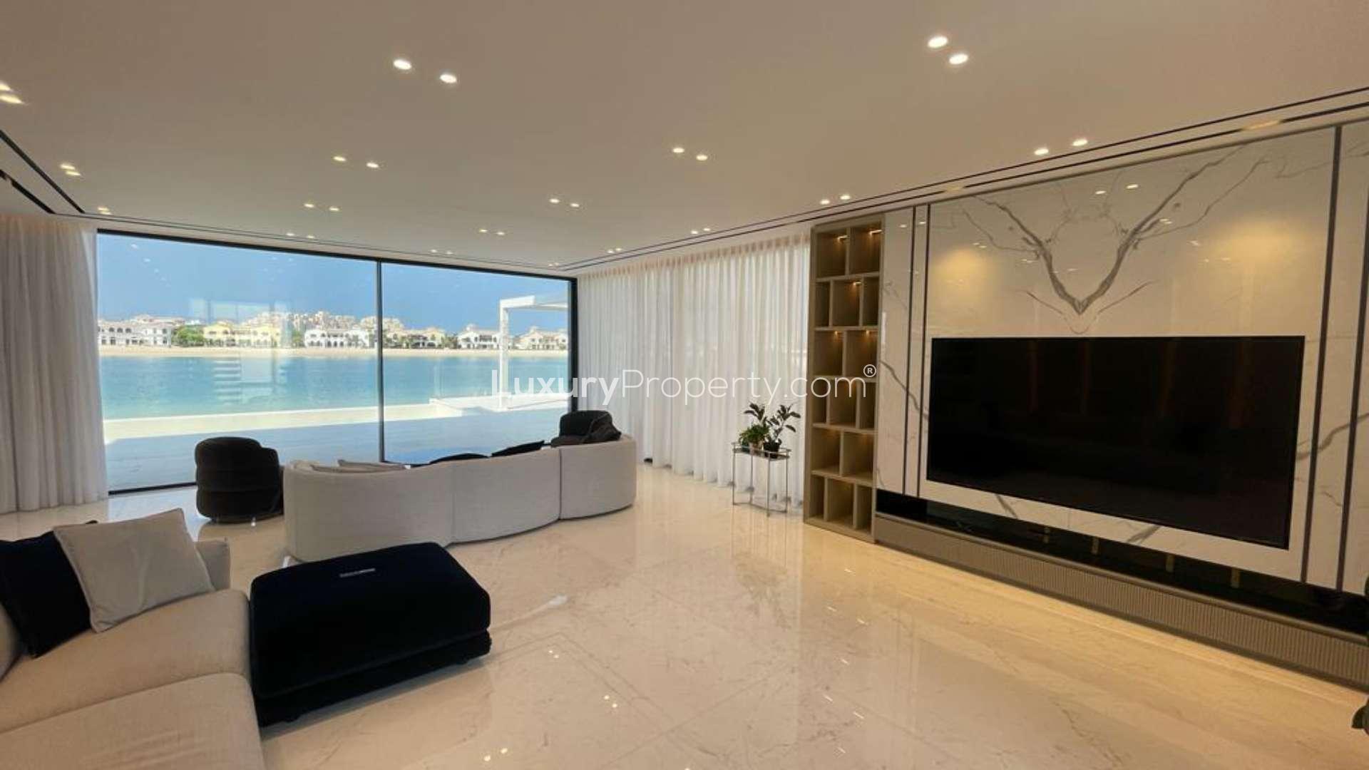 Luxurious living room with beachfront view in Palm Jumeirah villa, Garden Homes
