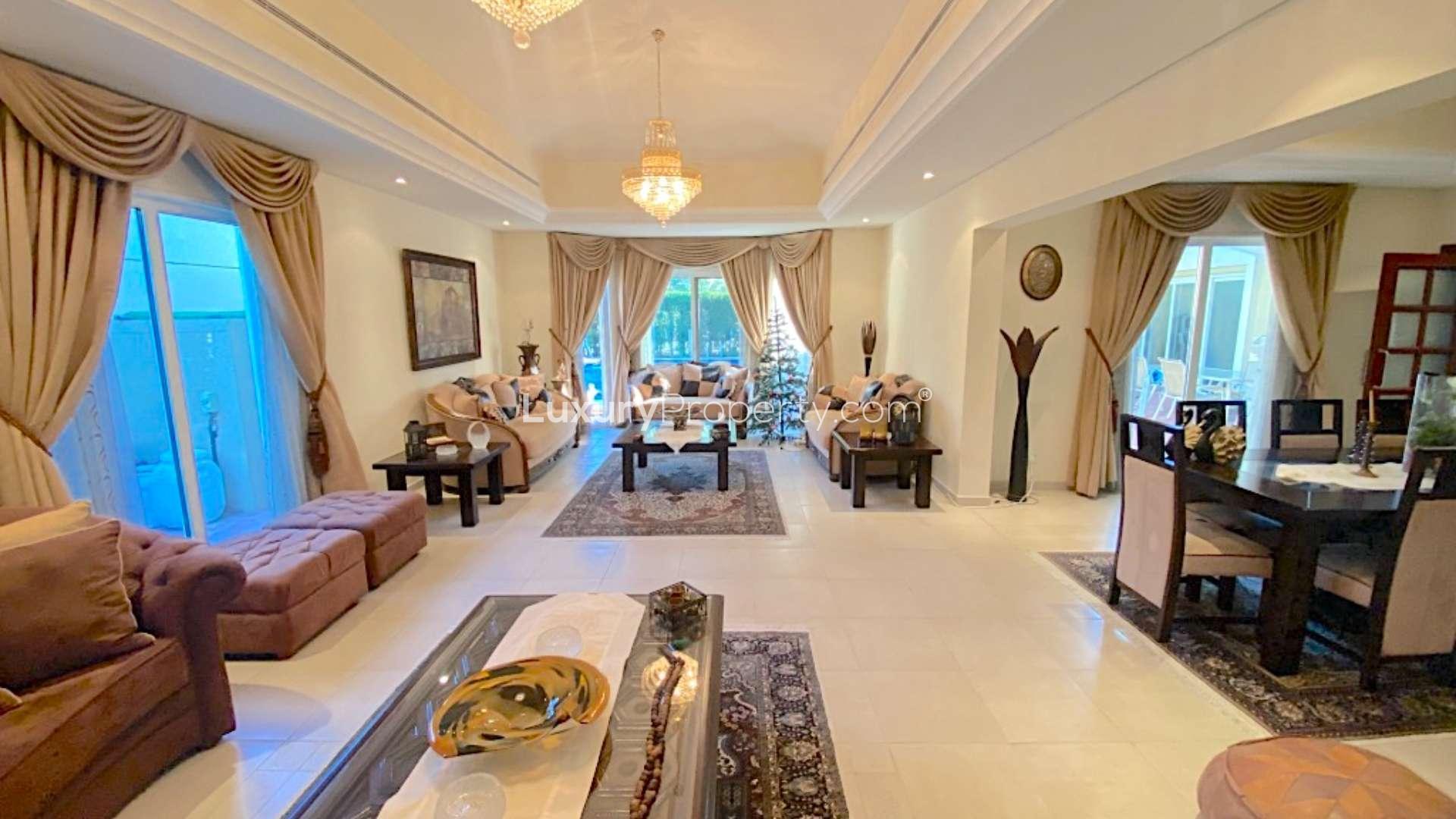 Elegant villa entrance with garden and patio in Green Community West, for sale