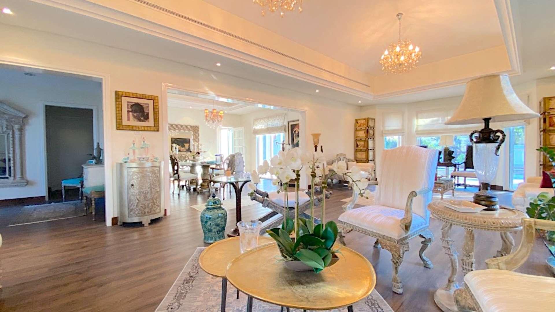 Luxurious living room in upgraded villa, Green Community West, featuring elegant decor and natural light