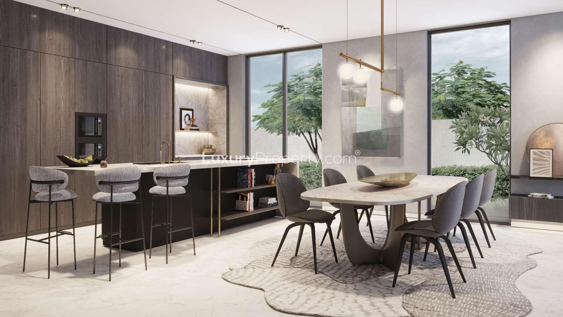 Contemporary villa exterior in Tilal Al Ghaf's Harmony community, featuring modern design and greenery