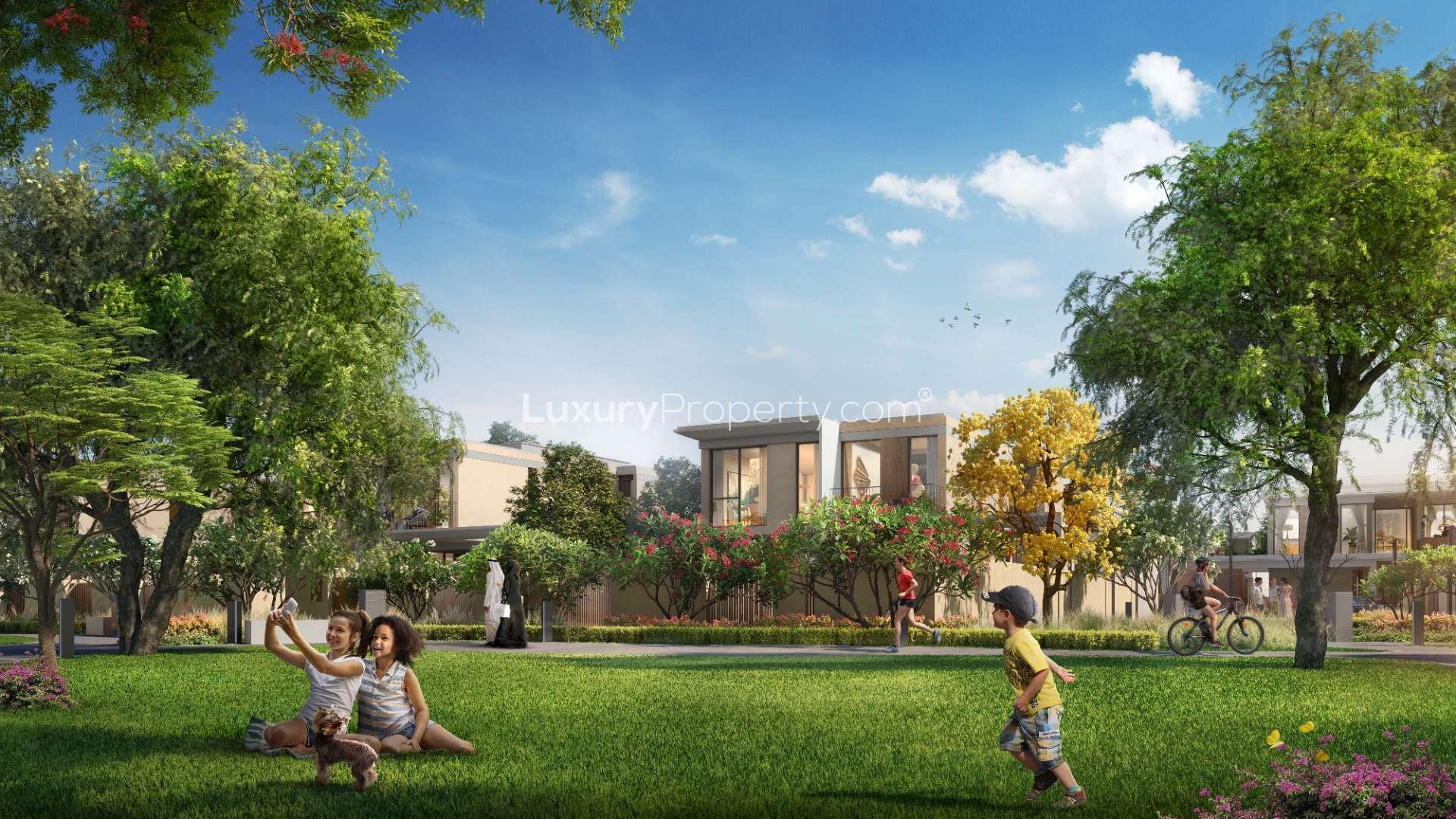 Elegant 4-bedroom villa exterior in Harmony, Tilal Al Ghaf, with lush landscaping