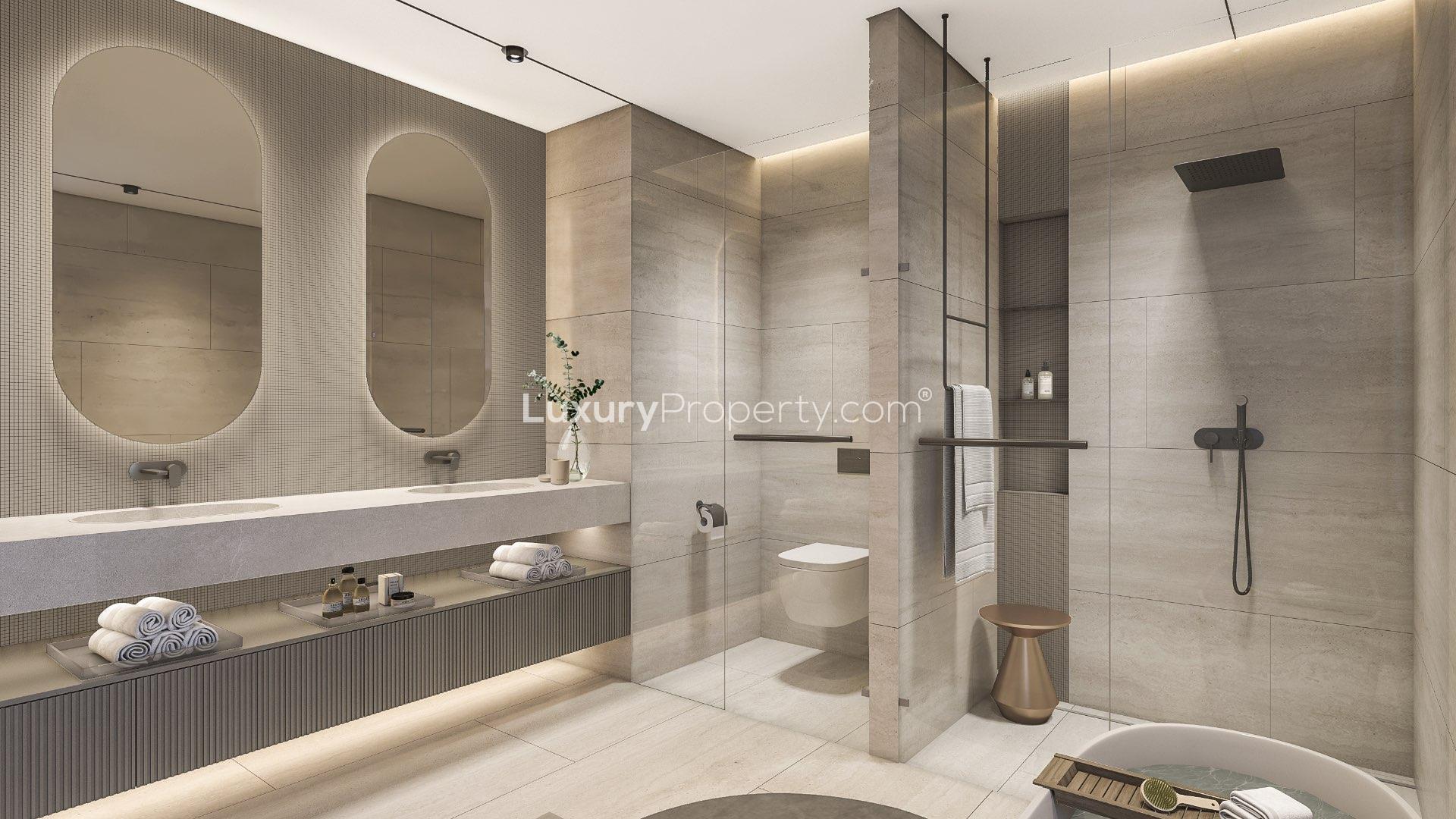 Modern kitchen and dining area in Tilal Al Ghaf villa, Harmony community, luxury interior design