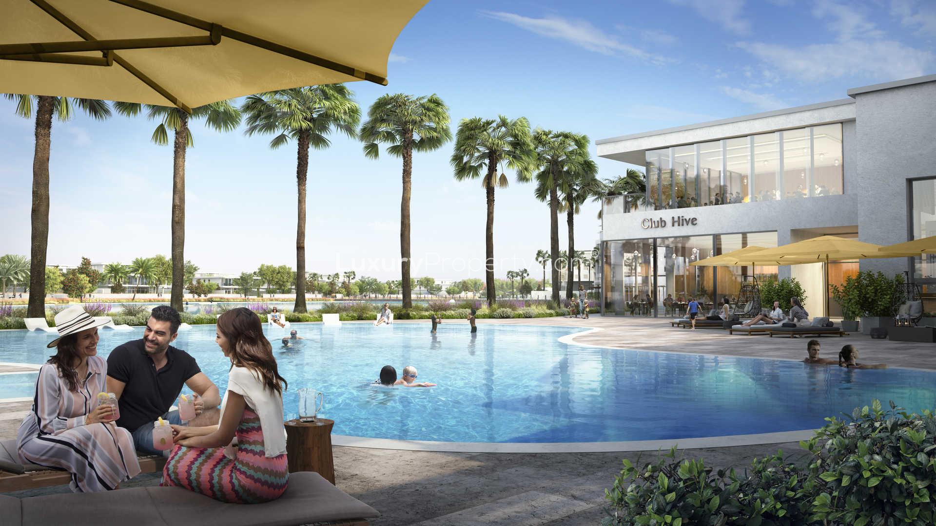 Aerial view of luxury villas and lagoon in Harmony, Tilal Al Ghaf community for sale