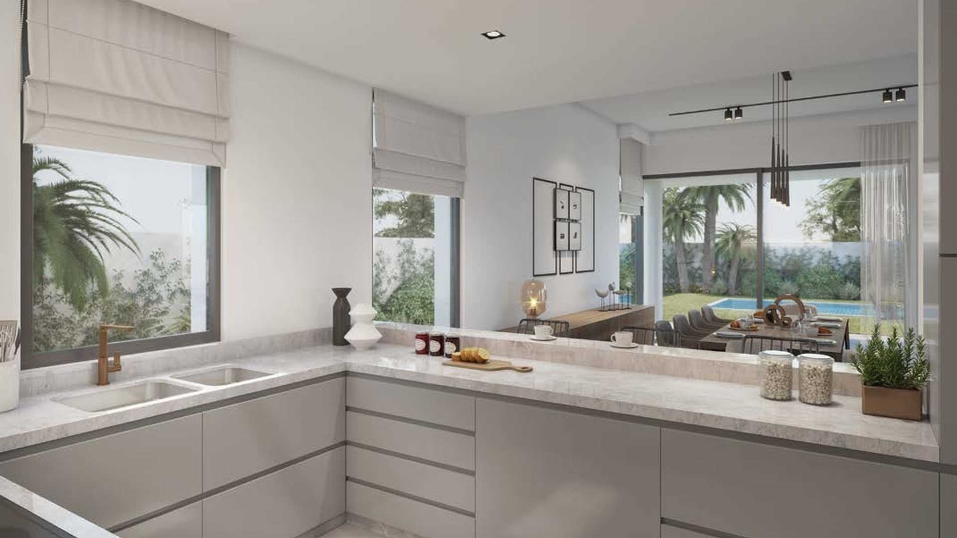 Luxurious living room in Harmony Villa, Tilal Al Ghaf with modern decor and garden views