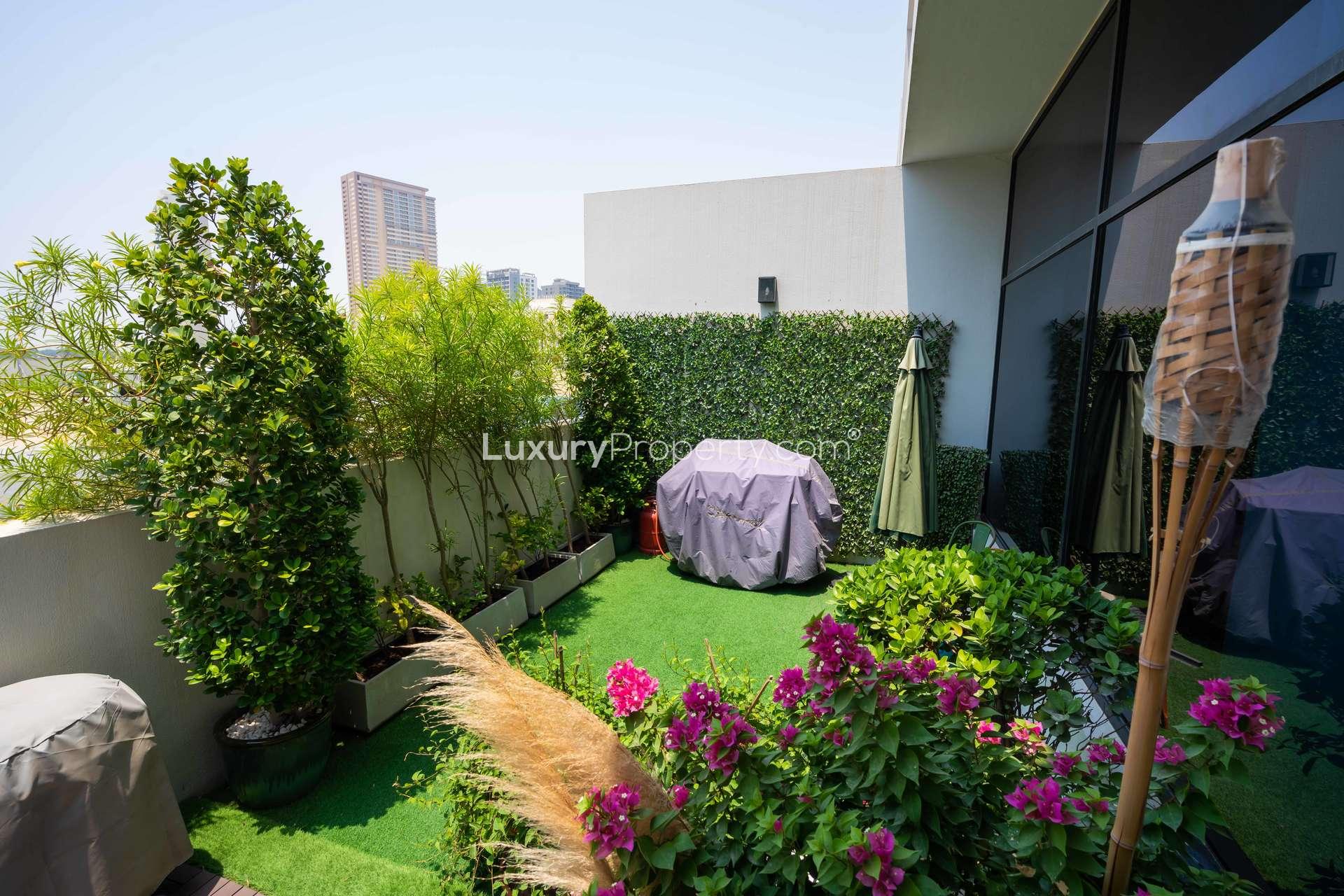 Luxurious triplex villa staircase with modern art in Hyati Residences, Jumeirah Village Circle