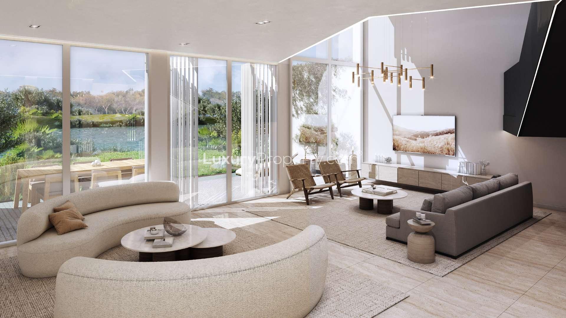 N/A,Luxurious living room with modern furniture in Al Barari villa, overlooking lush greenery