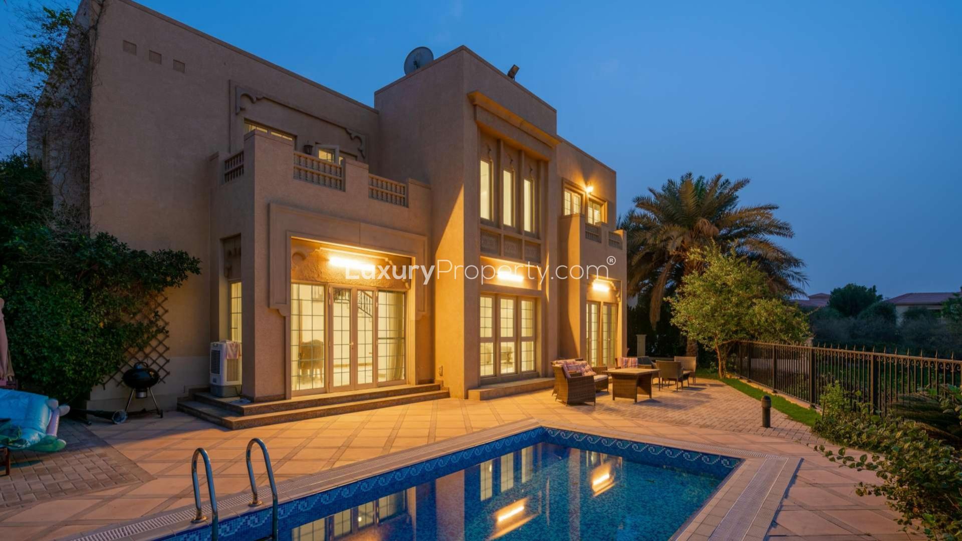 Living room in Dubai-style villa, Jumeirah Islands, with modern decor and large windows