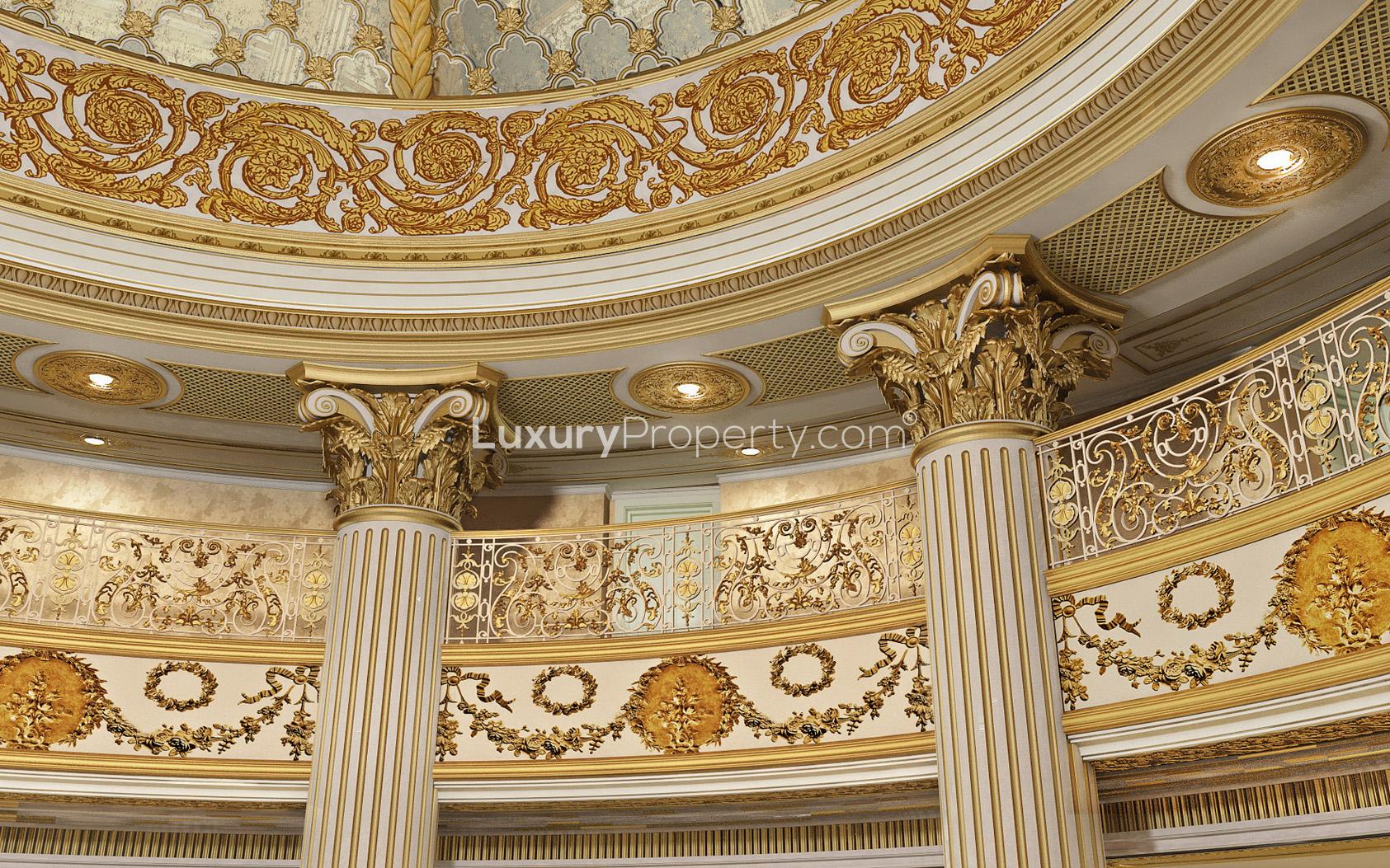 Luxurious interior of Kempinski Palm Jumeirah villa with ornate columns and elegant decor