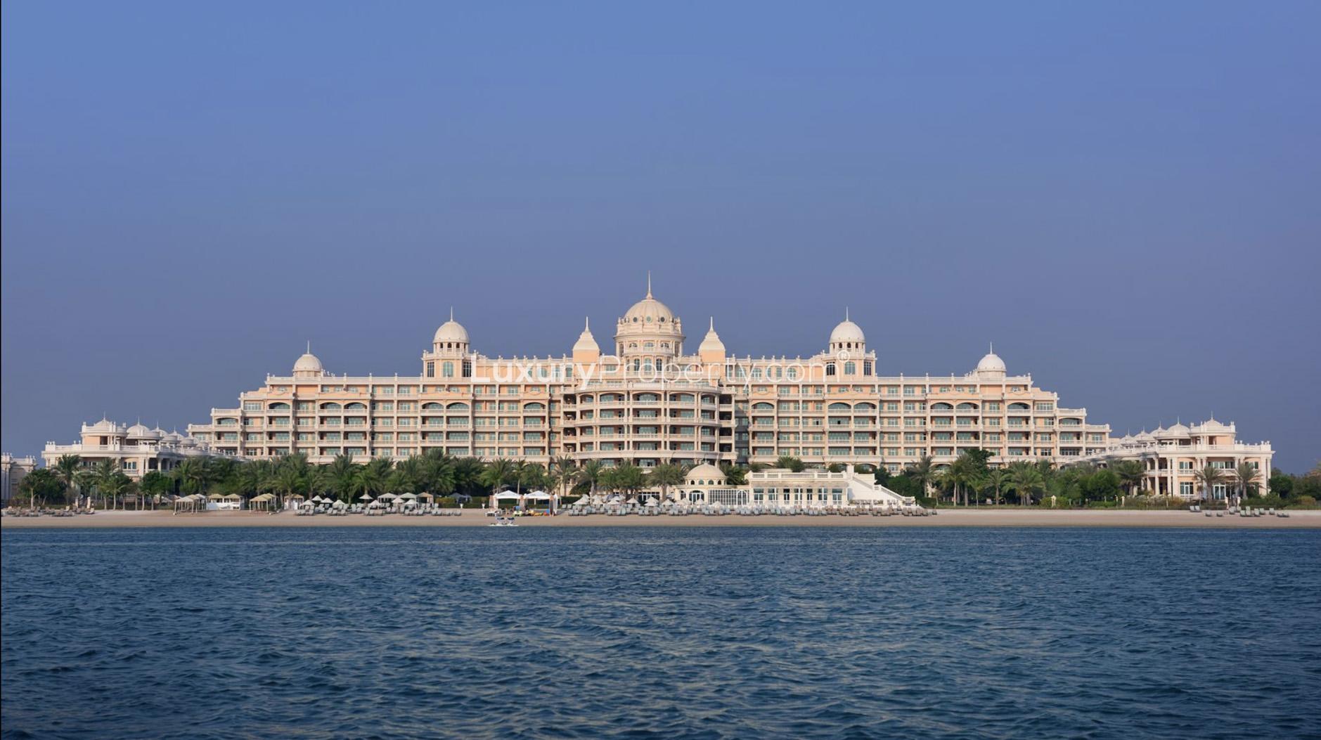 Luxurious villa exterior at Kempinski The Palm, Palm Jumeirah, lush gardens and architecture