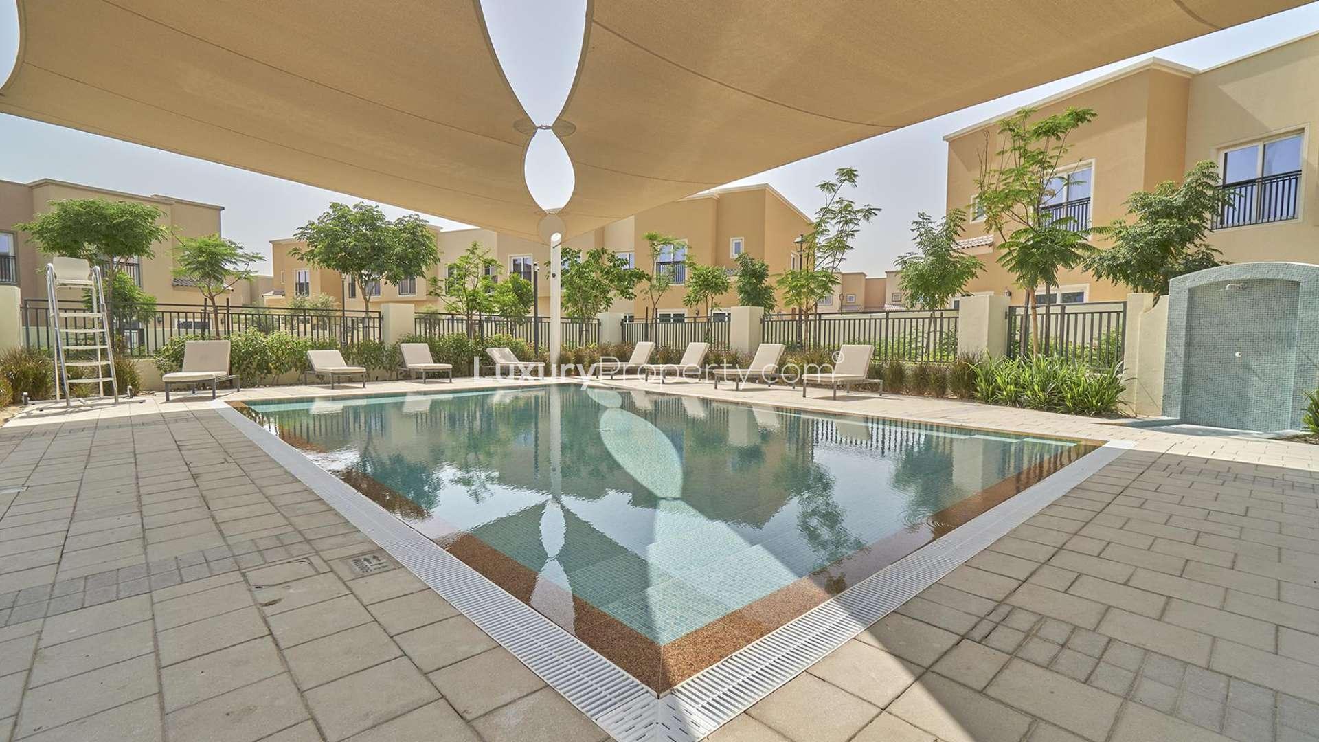 Colorful playground at four-bedroom villa in La Quinta, Villanova with shaded play area