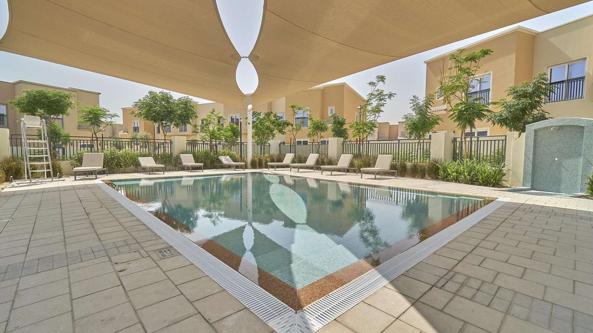 Colorful playground at four-bedroom villa in La Quinta, Villanova with shaded play area