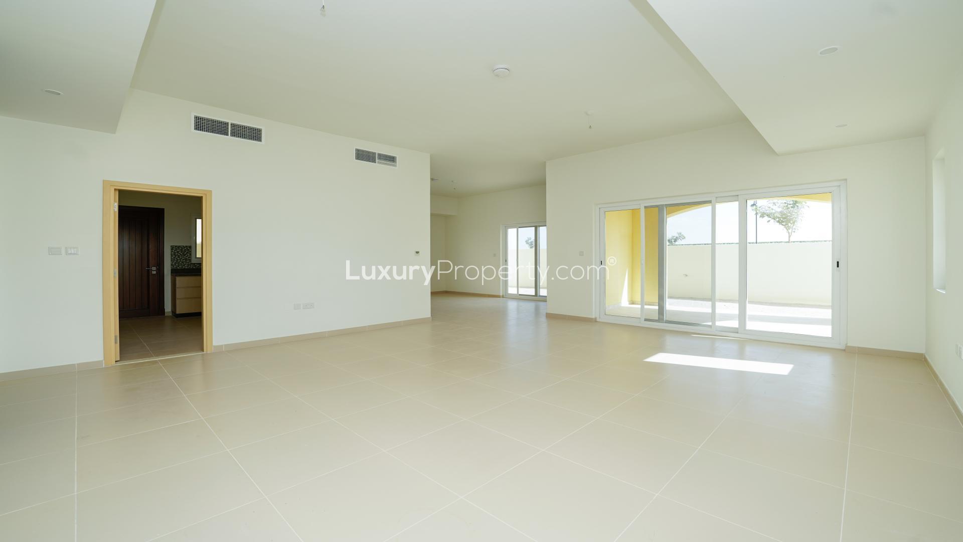 Interior of spacious villa in Villanova, Dubai Land, featuring modern kitchen and open layout
