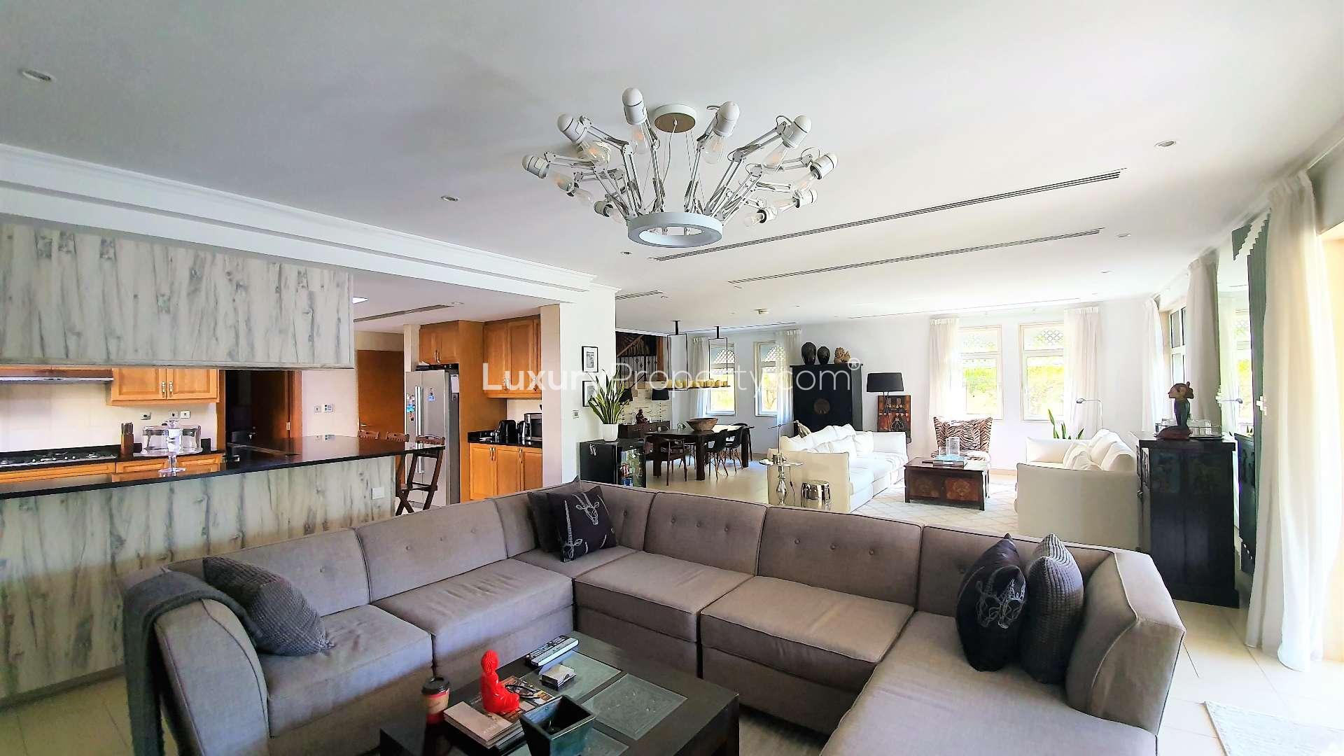 Spacious living room in Jumeirah Park villa with elegant decor and natural light