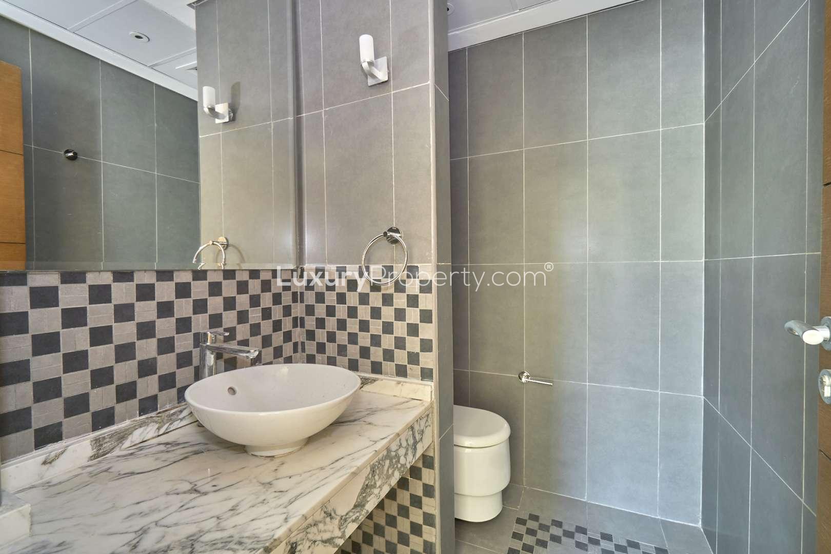 Spacious living area in Jumeirah Park Legacy Nova Villa for rent, bright and modern interior