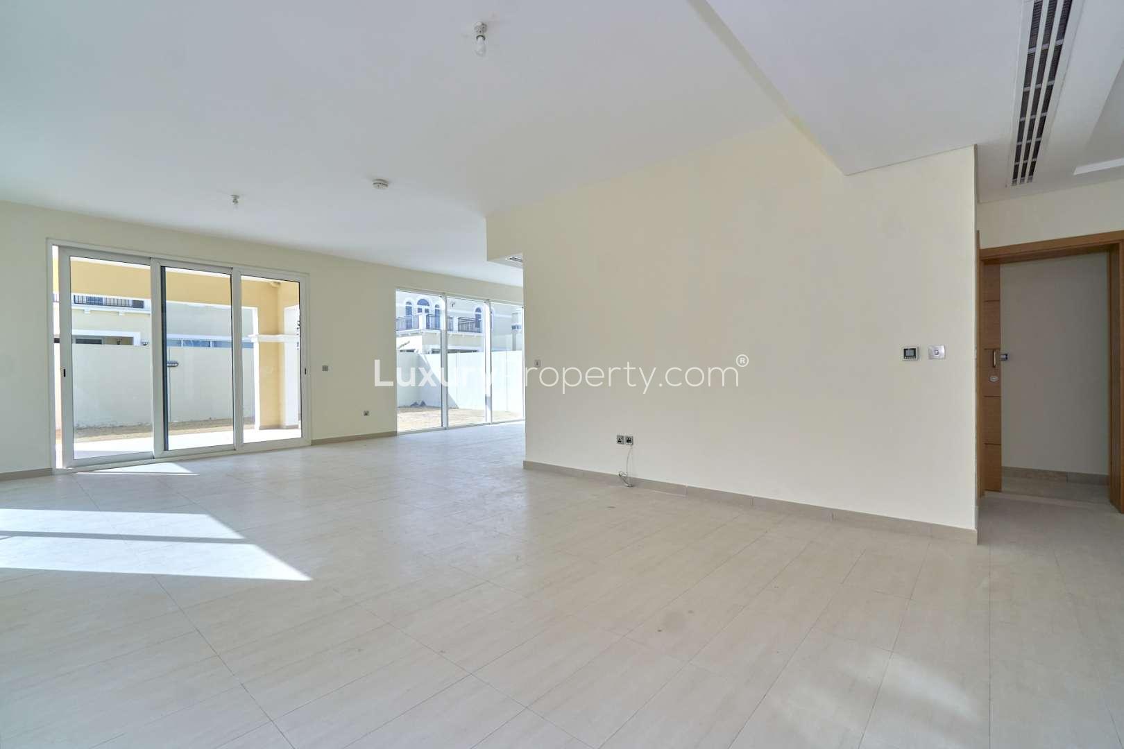 Villa exterior in Jumeirah Park's Legacy Nova Villas, featuring modern architecture and spacious design