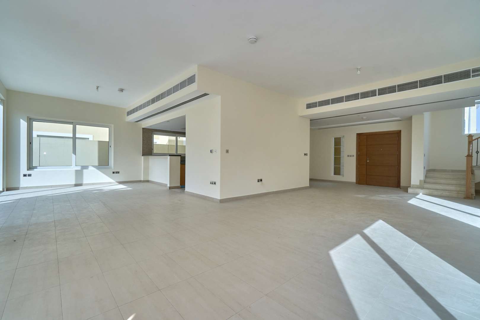 Spacious living area in Jumeirah Park villa with large windows and natural light