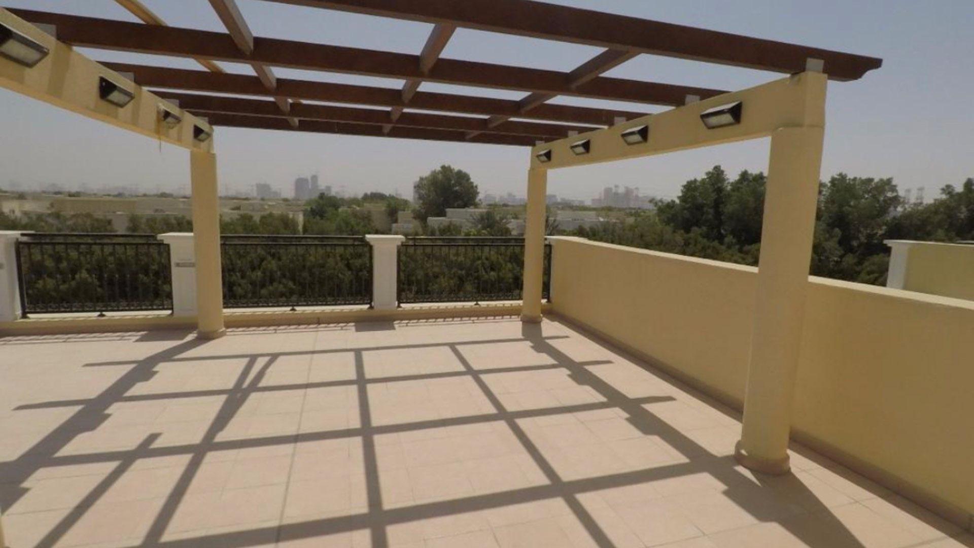 Bright living room with large windows in Jumeirah Park villa, Dubai