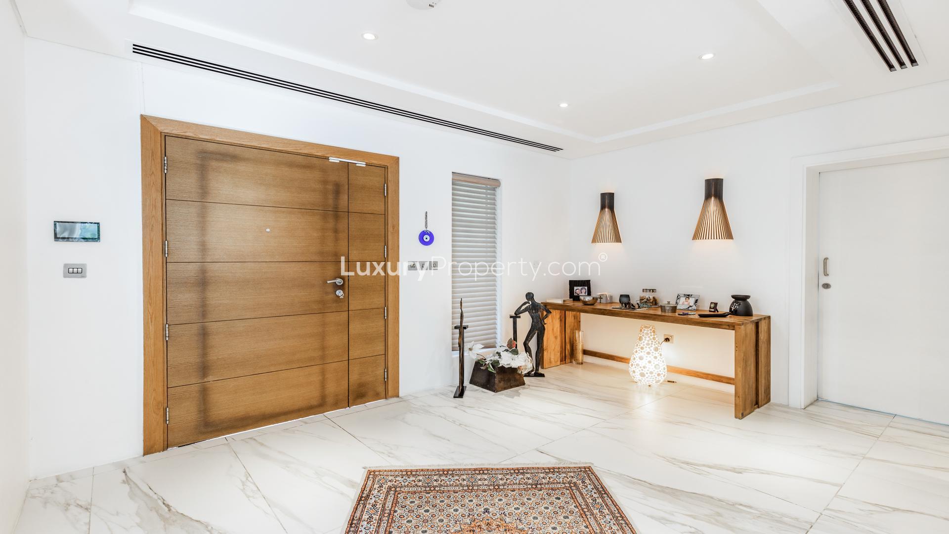 Entryway of upgraded villa in Jumeirah Park's Legacy Nova Villas with modern decor