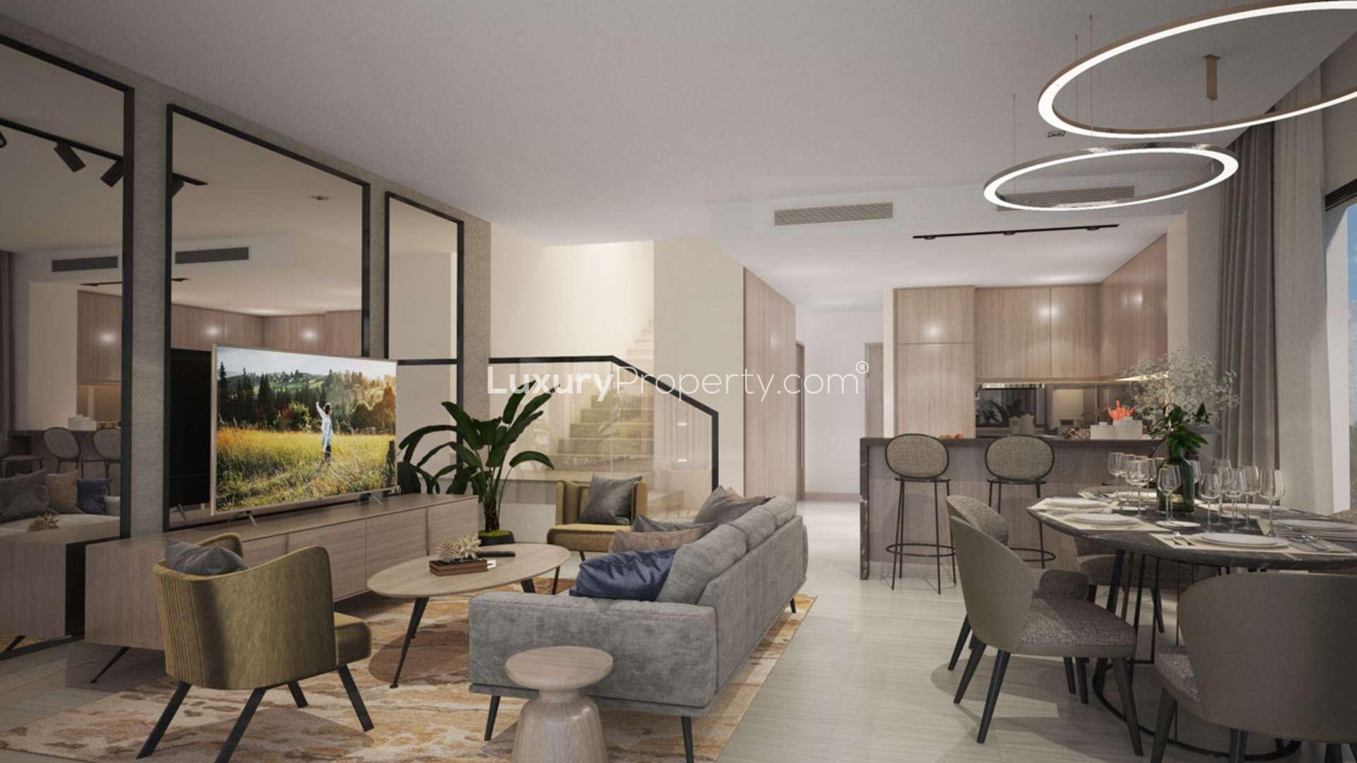 Modern four-bedroom villa exterior with golf course views in Damac Hills, Legend Villas