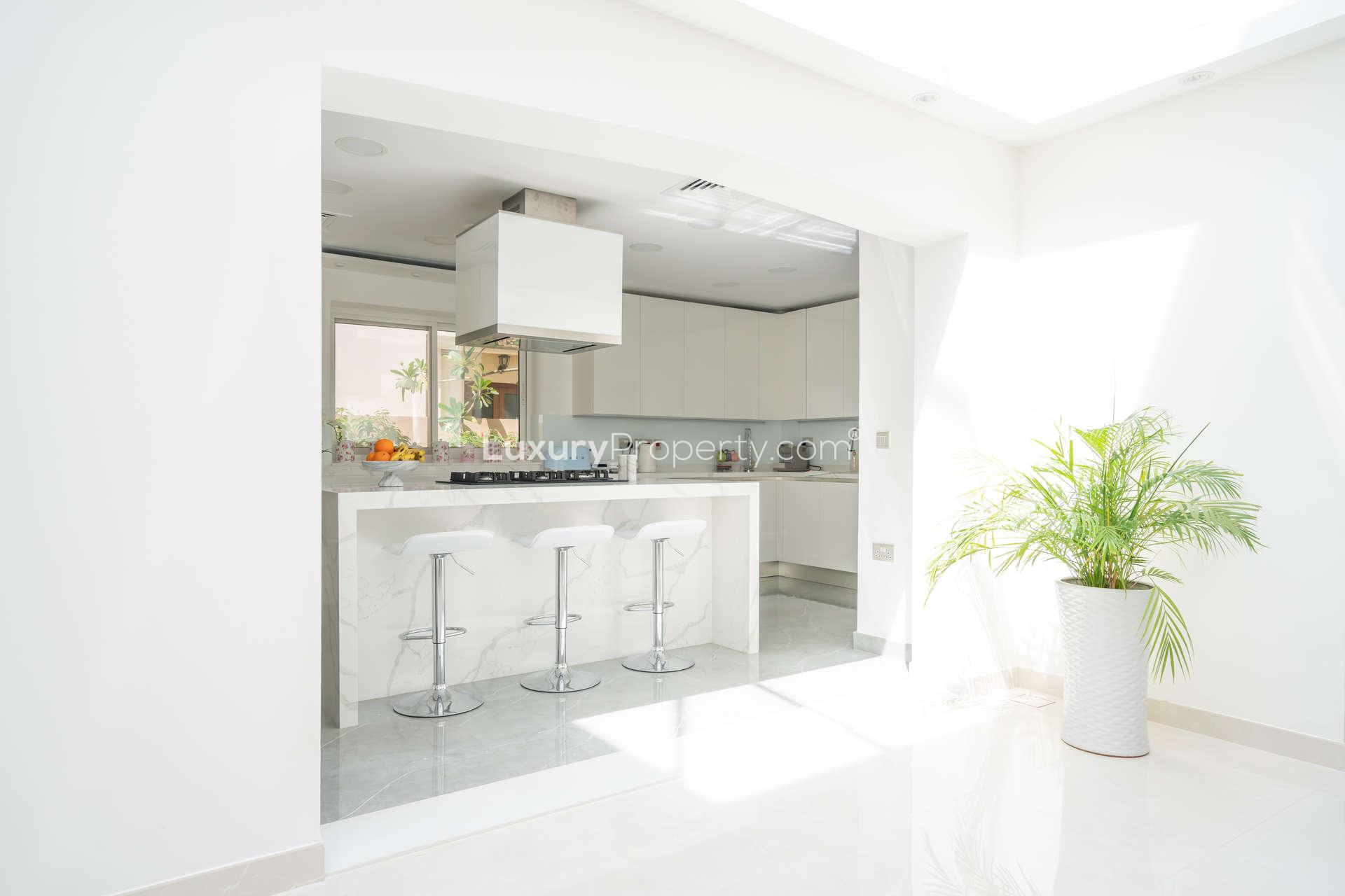 Skylight view in upgraded Jumeirah Golf Estates villa, Earth community, bright natural lighting