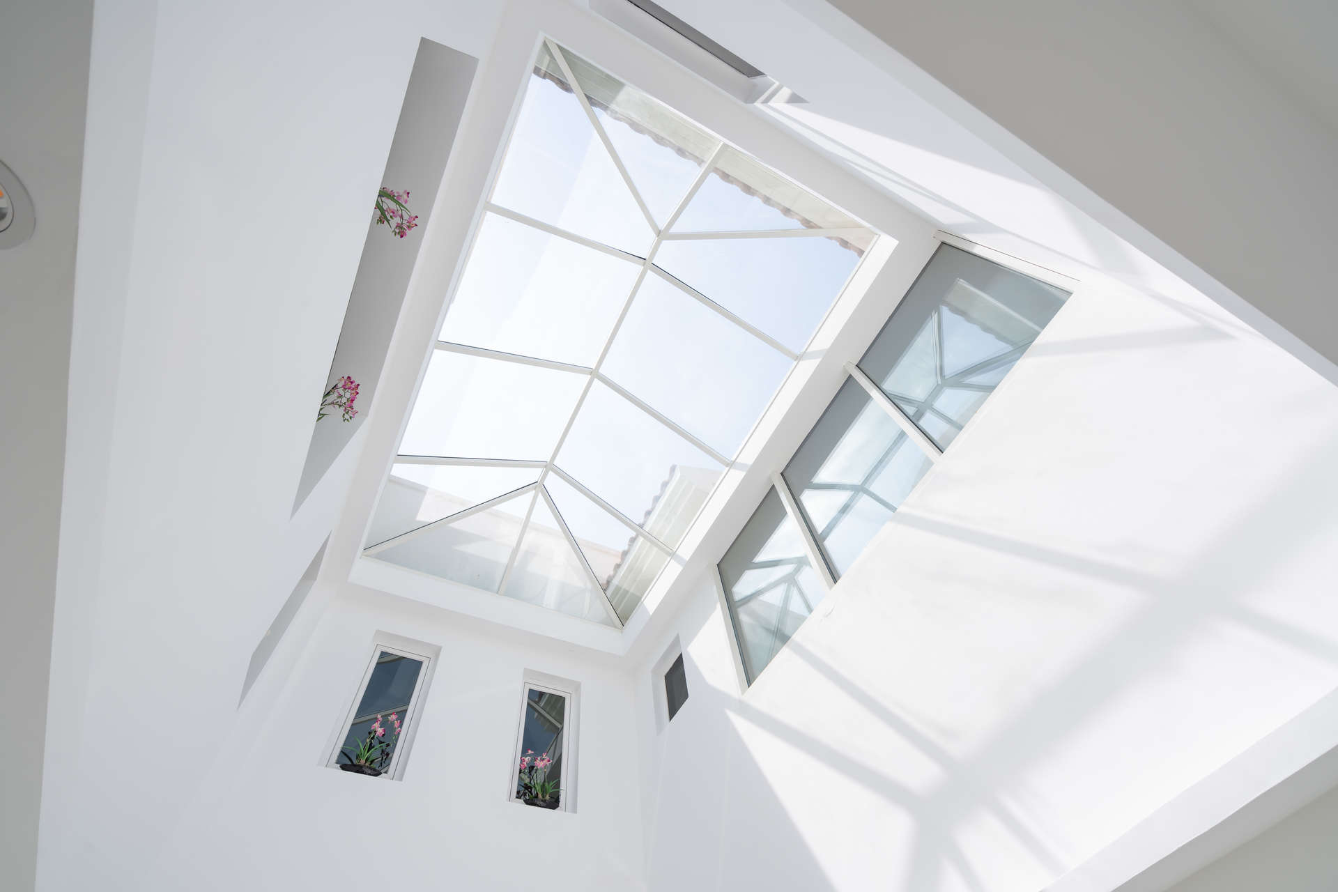 Bright, spacious villa interior with modern staircase in Jumeirah Golf Estates, Earth community